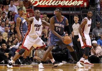 MIAMI, FL - APRIL 08:  Kwame Brown #54 of the Charlotte Bobcats posts up Joel Anthony #50 of the Miami Heat during a game at American Airlines Arena on April 8, 2011 in Miami, Florida. NOTE TO USER: User expressly acknowledges and agrees that, by download