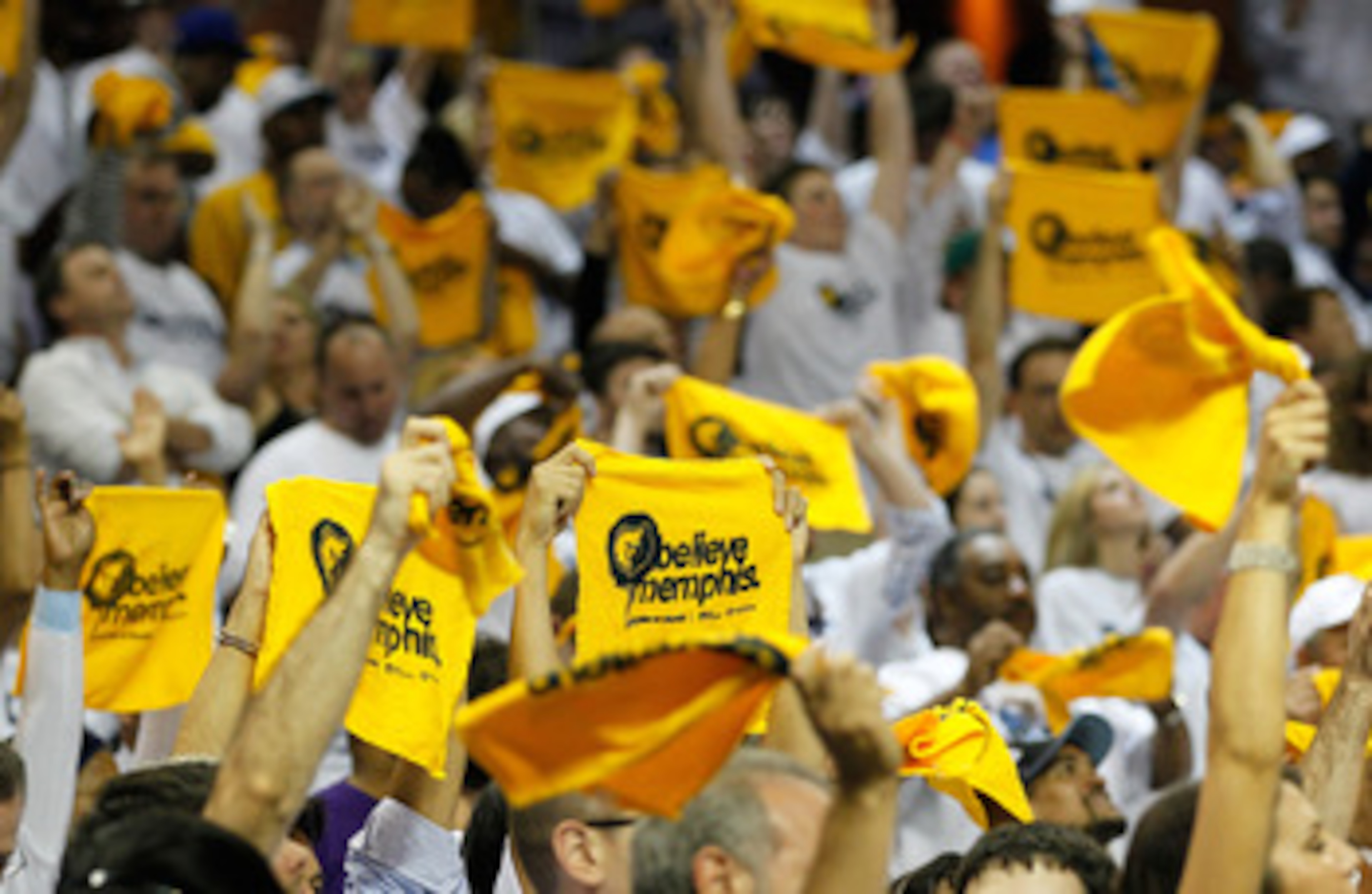 MEMPHIS, TN - MAY 13:  Memphis Grizzlies fans cheer against the Oklahoma City Thunder in Game Six of the Western Conference Semifinals in the 2011 NBA Playoffs at FedExForum on May 13, 2011 in Memphis, Tennessee.  NOTE TO USER: User expressly acknowledges