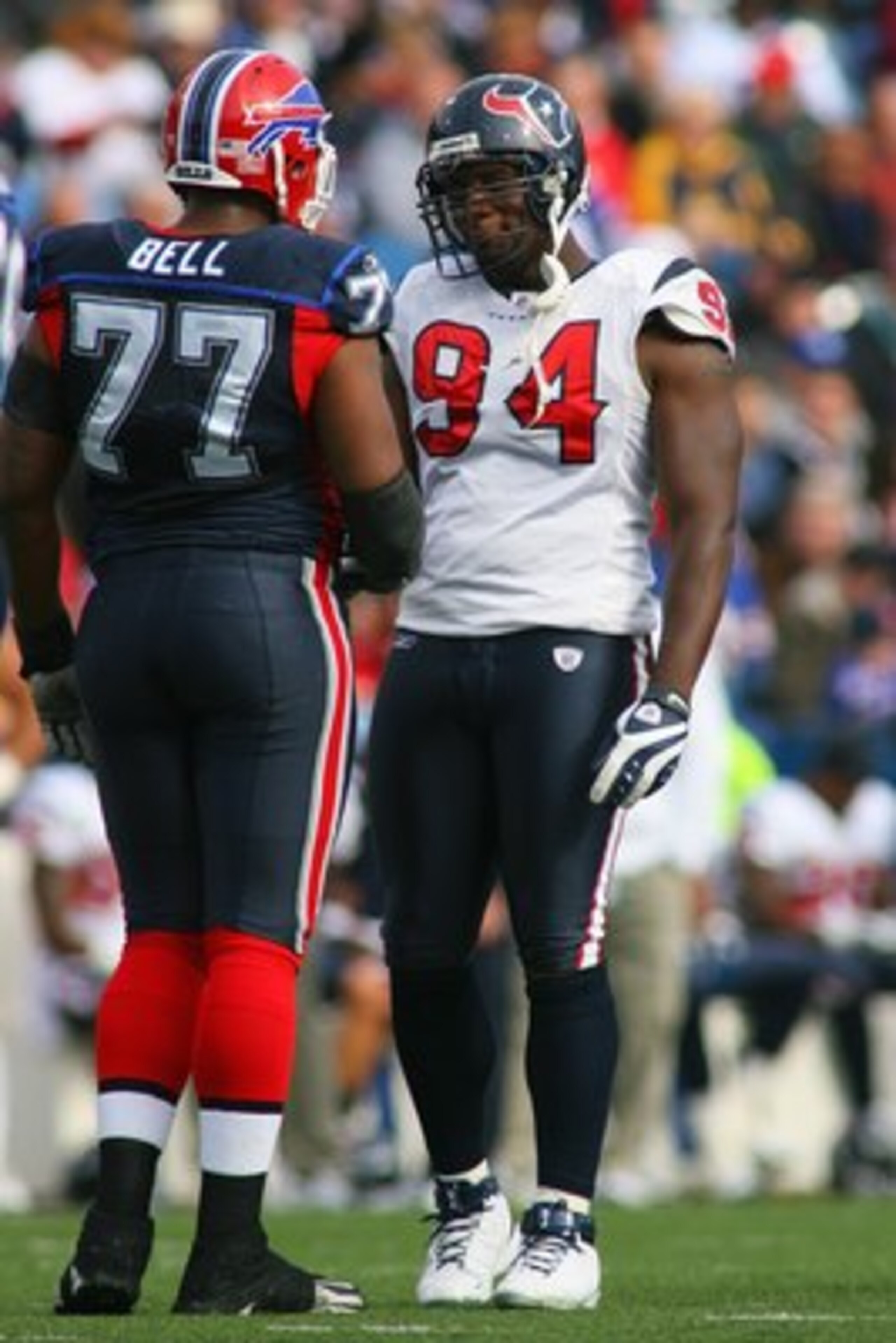 ORCHARD PARK, NY - NOVEMBER 01: Antonio Smith #94 of the Houston Texans speaks with Demetrius Bell #77 of the Buffalo Bills at Ralph Wilson Stadium on November 1, 2009 in Orchard Park, New York. Houston won 31-10. (Photo by Rick Stewart/Getty Images) ORCHARD PARK, NY - NOVEMBER 01: Antonio Smith #94 of the Houston Texans speaks with Demetrius Bell #77 of the Buffalo Bills at Ralph Wilson Stadium on November 1, 2009 in Orchard Park, New York. Houston won 31-10. (Photo by Rick Stewart/Getty Images)