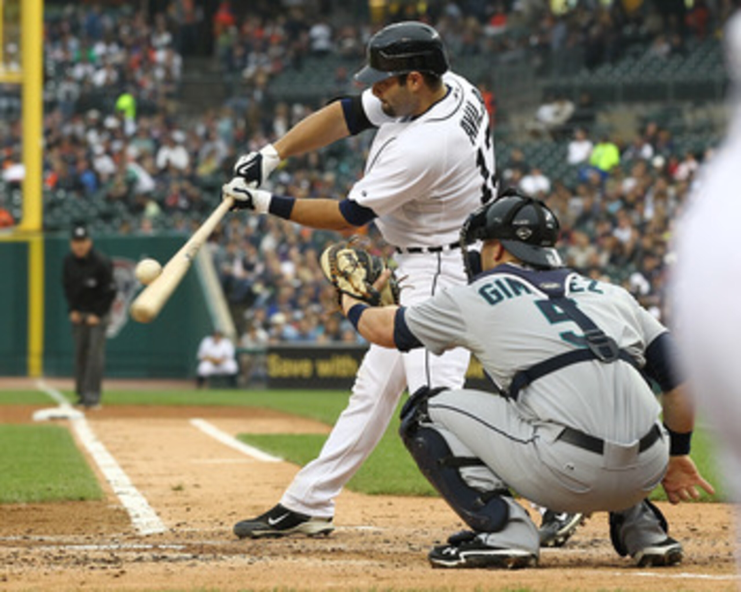 DETROIT, MI - JUNE 10:  Catcher Alex Avila #13 of the Detroit Tigers makes contact on a pitch during a MLB game against the Seattle Mariners at Comerica Park on June 10, 2011 in Detroit, Michigan.  Seattle defeated Detroit 3-2.  (Photo by Dave Reginek/Get