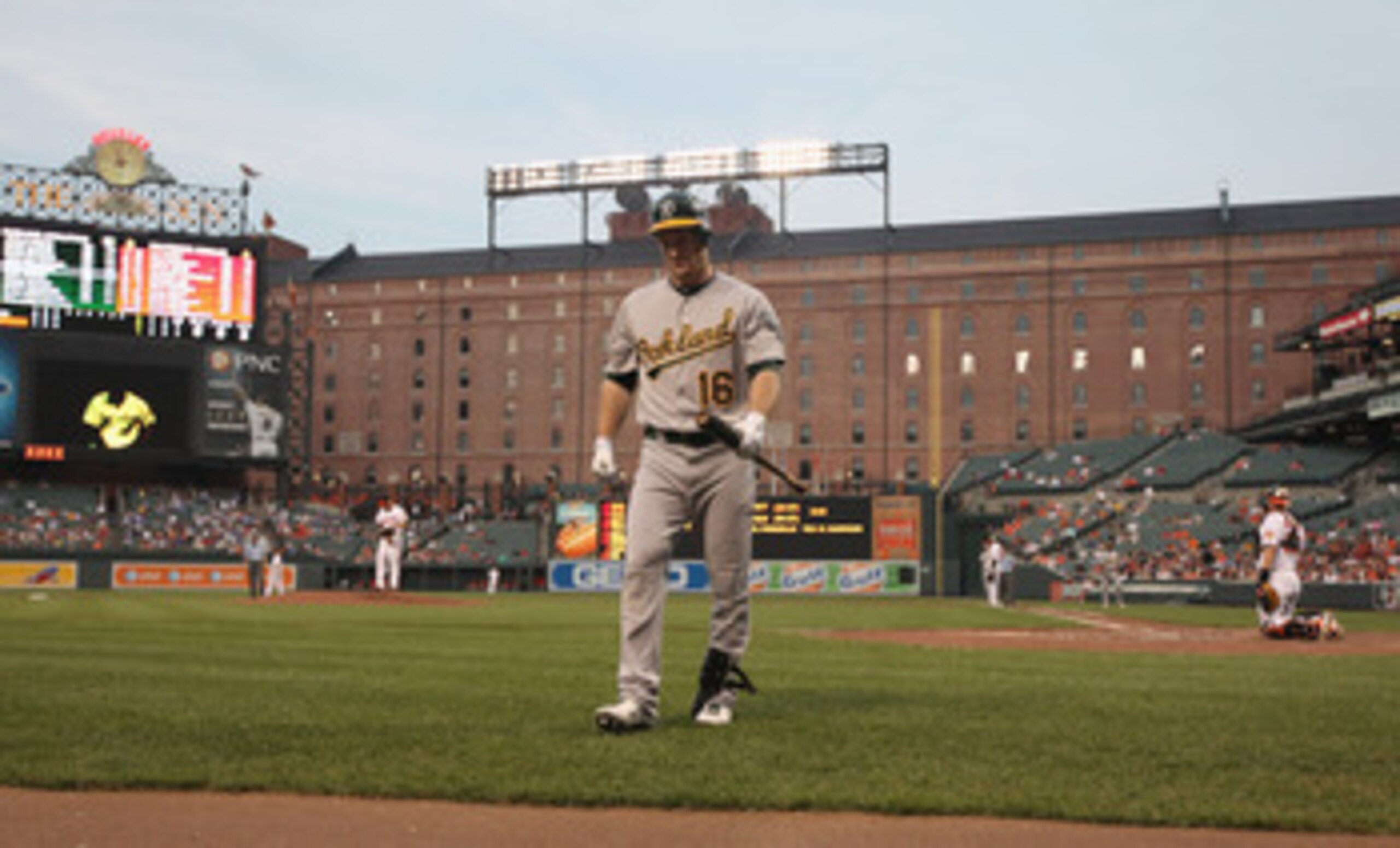 BALTIMORE, MD - JUNE 07: Josh Willingham #16 of the Oakland Athletics walks back to the dugout after striking out against the Baltimore Orioles during the fourth inning at Oriole Park at Camden Yards on June 7, 2011 in Baltimore, Maryland.  (Photo by Rob