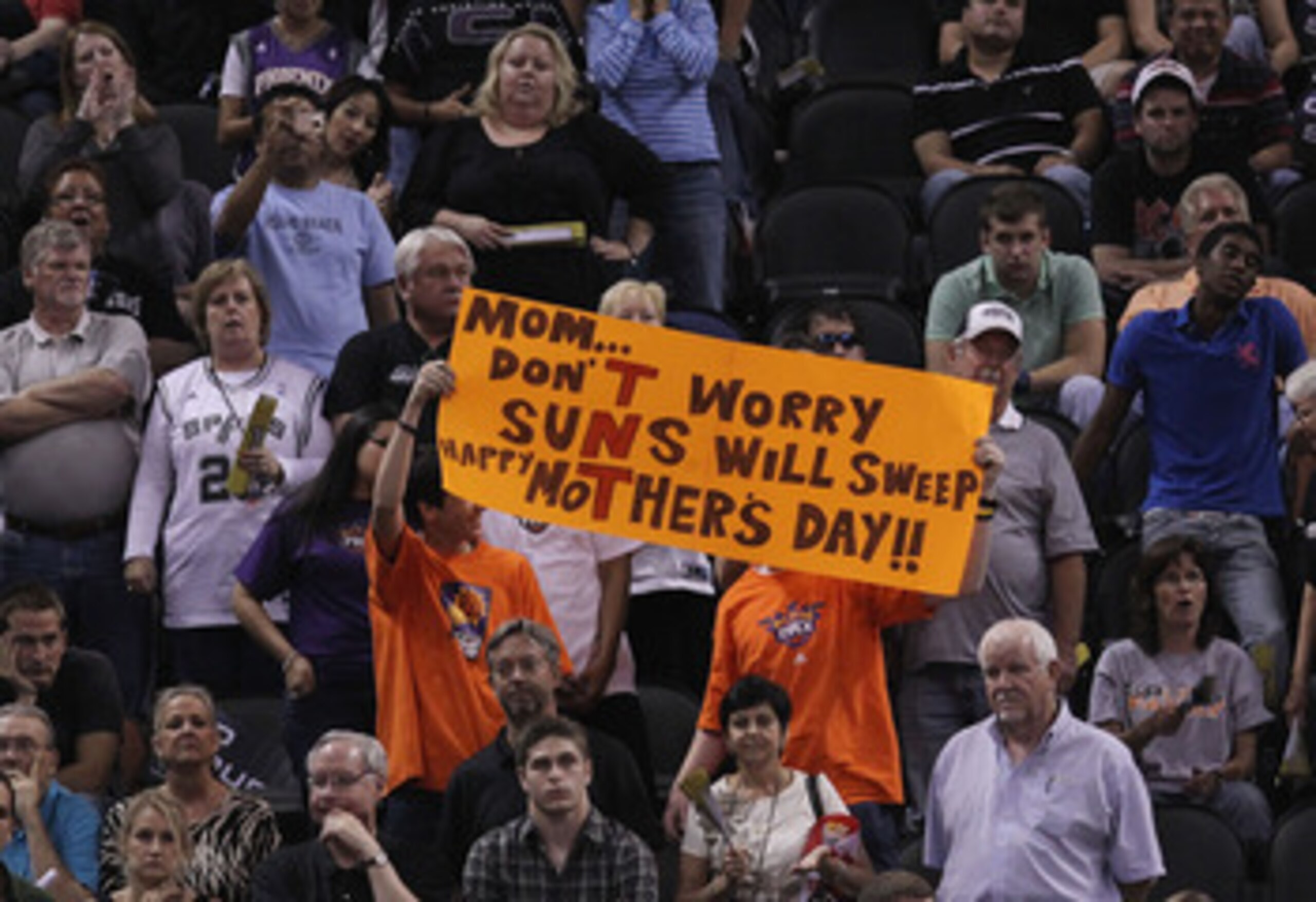 SAN ANTONIO - MAY 09:  Fans of the Phoenix Suns hold up a sign against the San Antonio Spurs in Game Four of the Western Conference Semifinals during the 2010 NBA Playoffs at AT&T Center on May 9, 2010 in San Antonio, Texas. NOTE TO USER: User expressly a