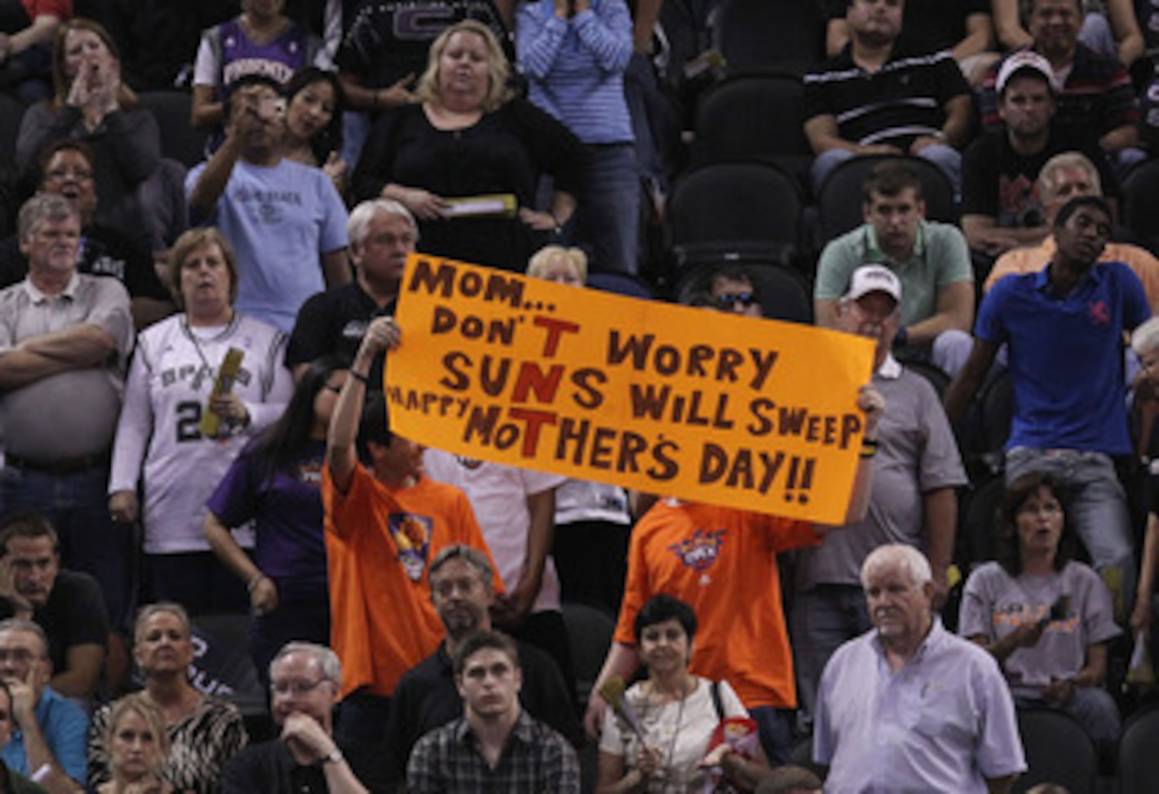 SAN ANTONIO - MAY 09:  Fans of the Phoenix Suns hold up a sign against the San Antonio Spurs in Game Four of the Western Conference Semifinals during the 2010 NBA Playoffs at AT&T Center on May 9, 2010 in San Antonio, Texas. NOTE TO USER: User expressly a