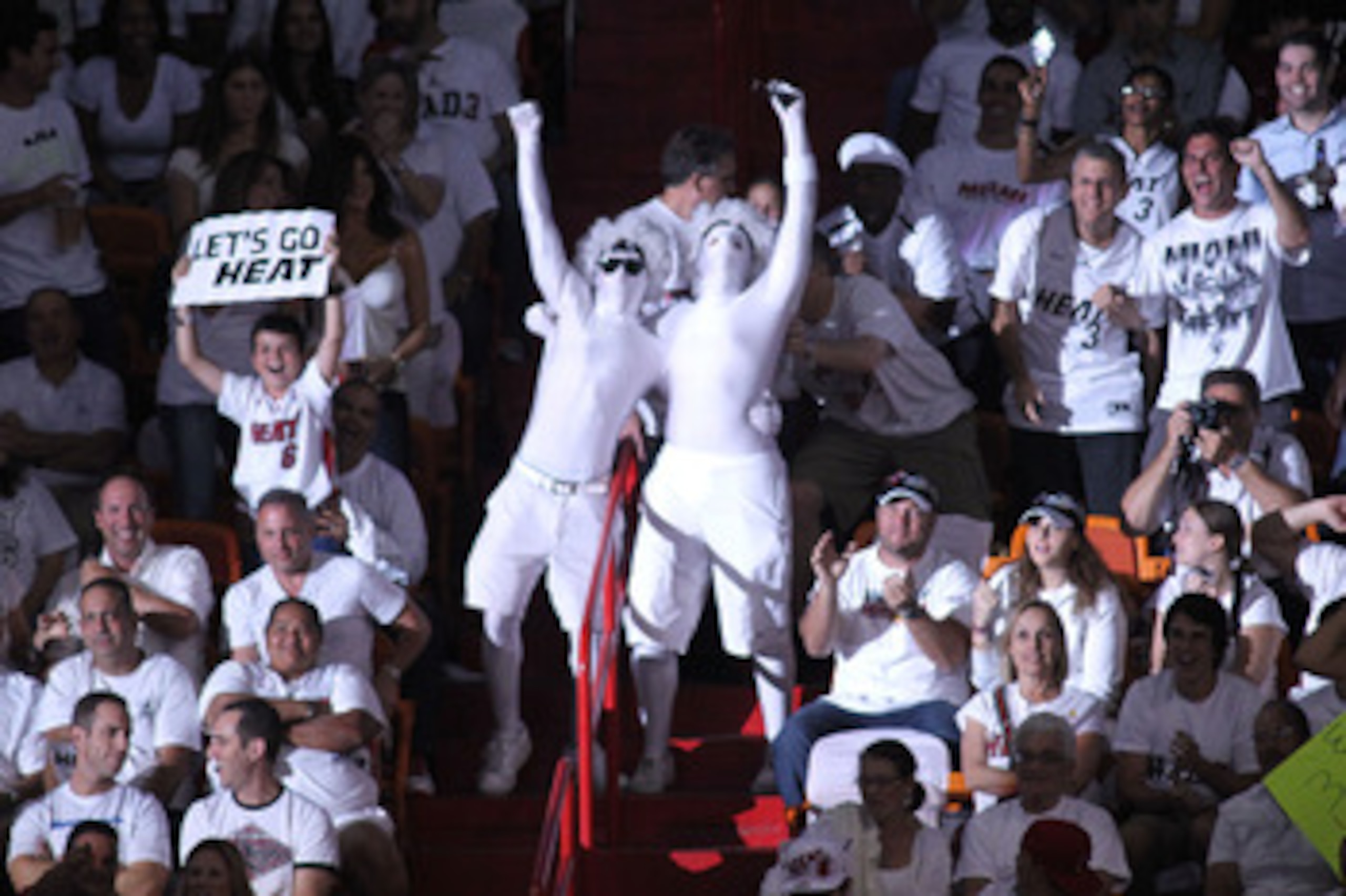 MIAMI, FL - JUNE 02:  Fans of the Miami Heat support their team against the Dallas Mavericks in Game Two of the 2011 NBA Finals at American Airlines Arena on June 2, 2011 in Miami, Florida. NOTE TO USER: User expressly acknowledges and agrees that, by dow