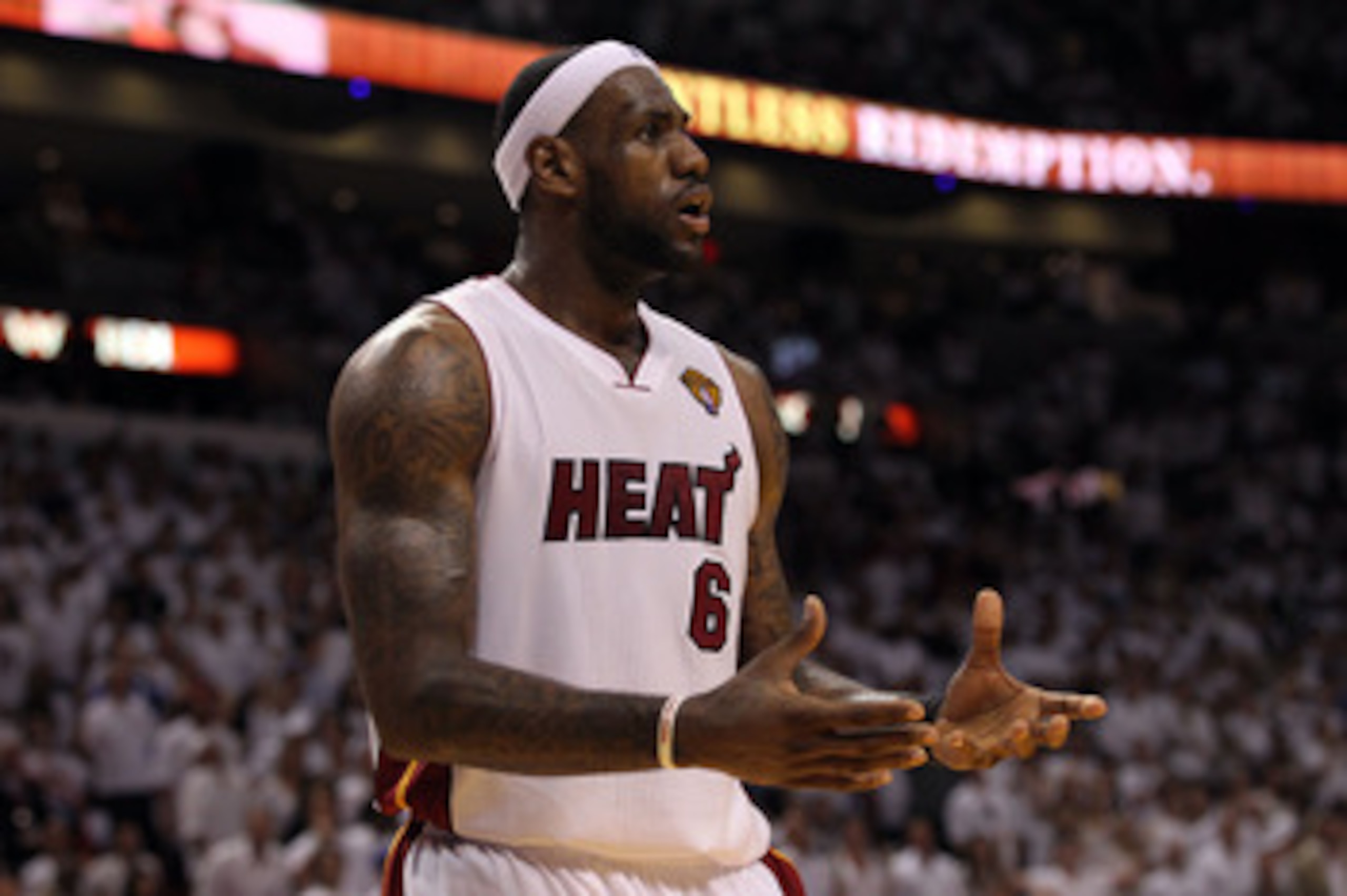 MIAMI, FL - JUNE 12:  LeBron James #6 of the Miami Heat reacts against the Dallas Mavericks in Game Six of the 2011 NBA Finals at American Airlines Arena on June 12, 2011 in Miami, Florida. NOTE TO USER: User expressly acknowledges and agrees that, by dow