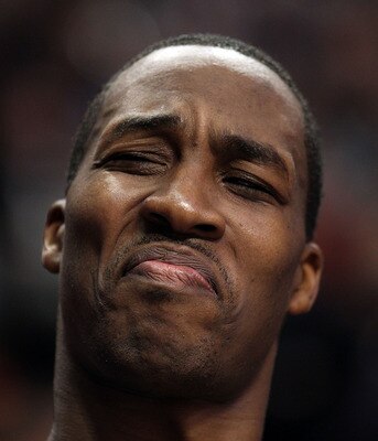 CHICAGO, IL - JANUARY 28: Dwight Howard #12 of the Orlando Magic reacts to the taunts of a fan as he sits on the bench during a game against the Chicago Bulls at the United Center on January 28, 2011 in Chicago, Illinois. NOTE TO USER: User expressly ackn