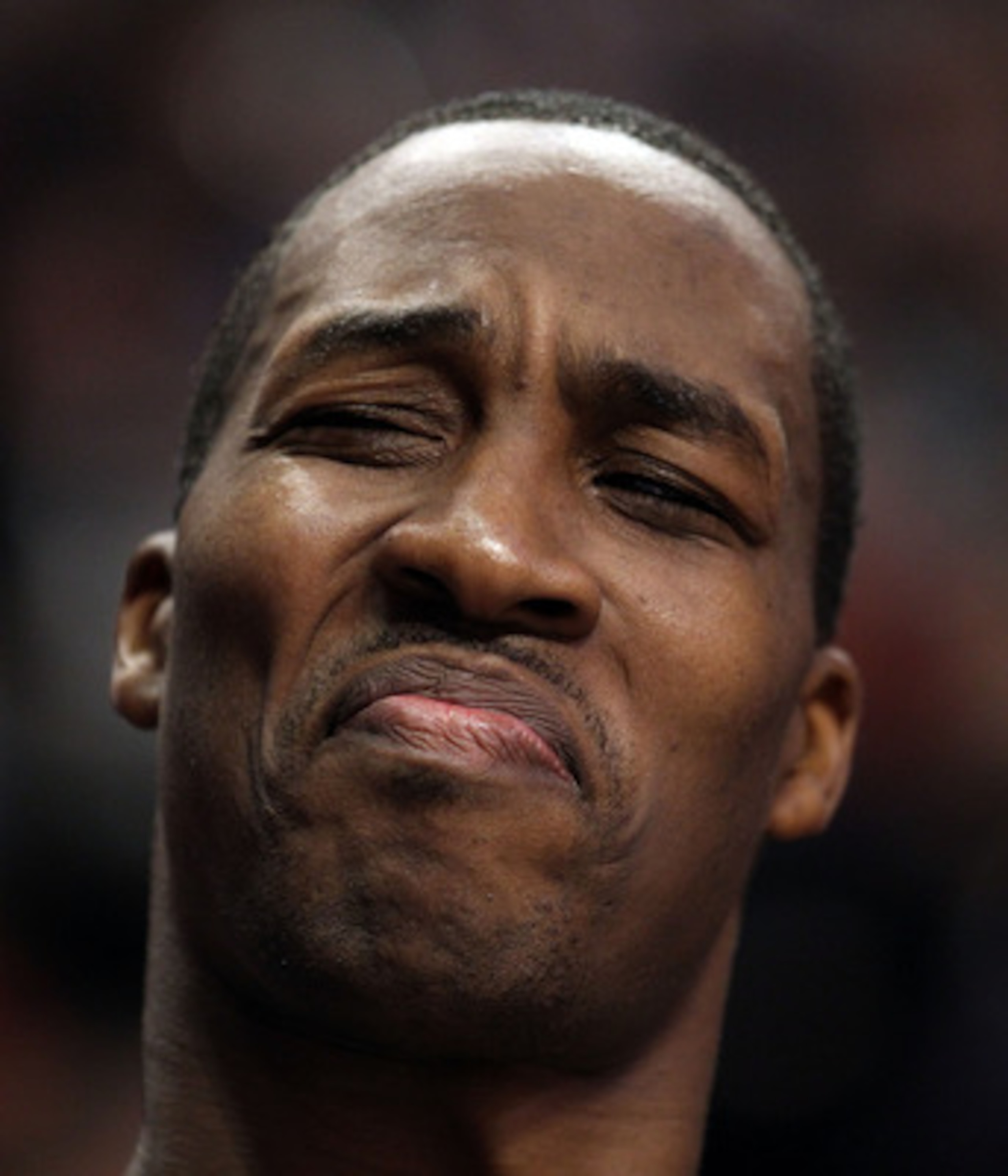 CHICAGO, IL - JANUARY 28: Dwight Howard #12 of the Orlando Magic reacts to the taunts of a fan as he sits on the bench during a game against the Chicago Bulls at the United Center on January 28, 2011 in Chicago, Illinois. NOTE TO USER: User expressly ackn