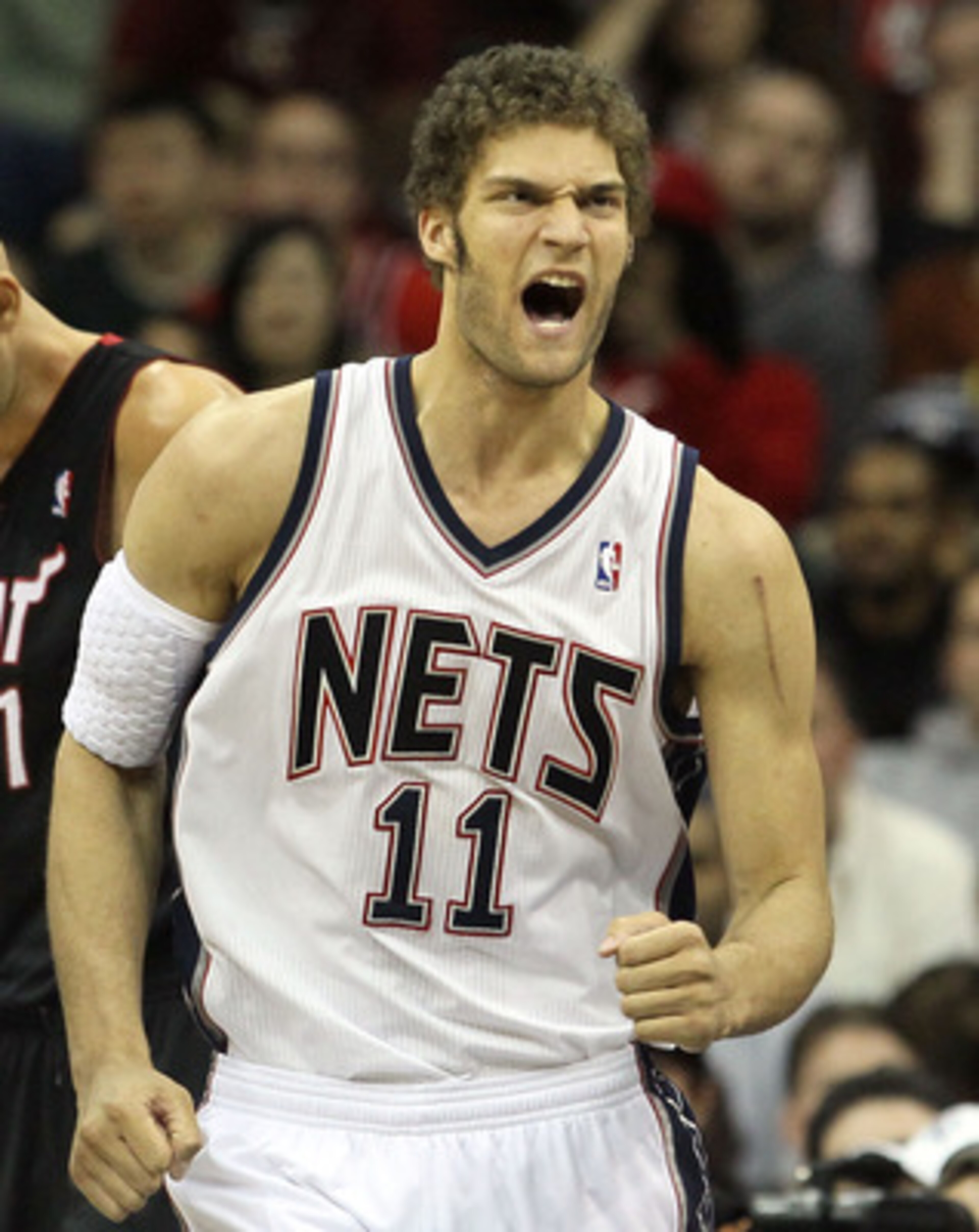 NEWARK, NJ - APRIL 03: Brook Lopez #11 of the New Jersey Nets reacts against the Miami Heat at the Prudential Center on April 3, 2011 in Newark, New Jersey.The Heat defeated the Nets 108-94.NOTE TO USER: User expressly acknowledges and agrees that, by do NEWARK, NJ - APRIL 03: Brook Lopez #11 of the New Jersey Nets reacts against the Miami Heat at the Prudential Center on April 3, 2011 in Newark, New Jersey.The Heat defeated the Nets 108-94.NOTE TO USER: User expressly acknowledges and agrees that, by do