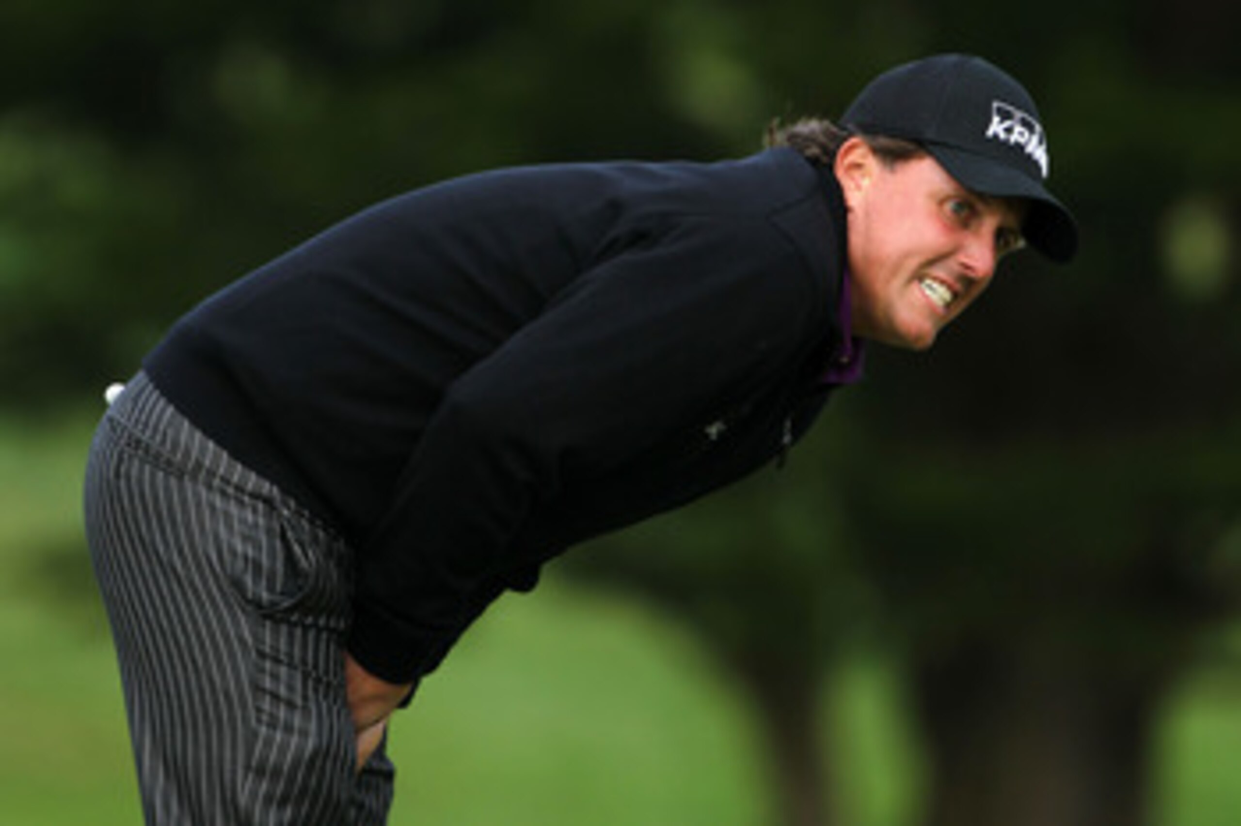 PEBBLE BEACH, CA - JUNE 18:  Phil Mickelson reacts to missed putt on the 14th green during the second round of the 110th U.S. Open at Pebble Beach Golf Links on June 18, 2010 in Pebble Beach, California.  (Photo by Donald Miralle/Getty Images)
