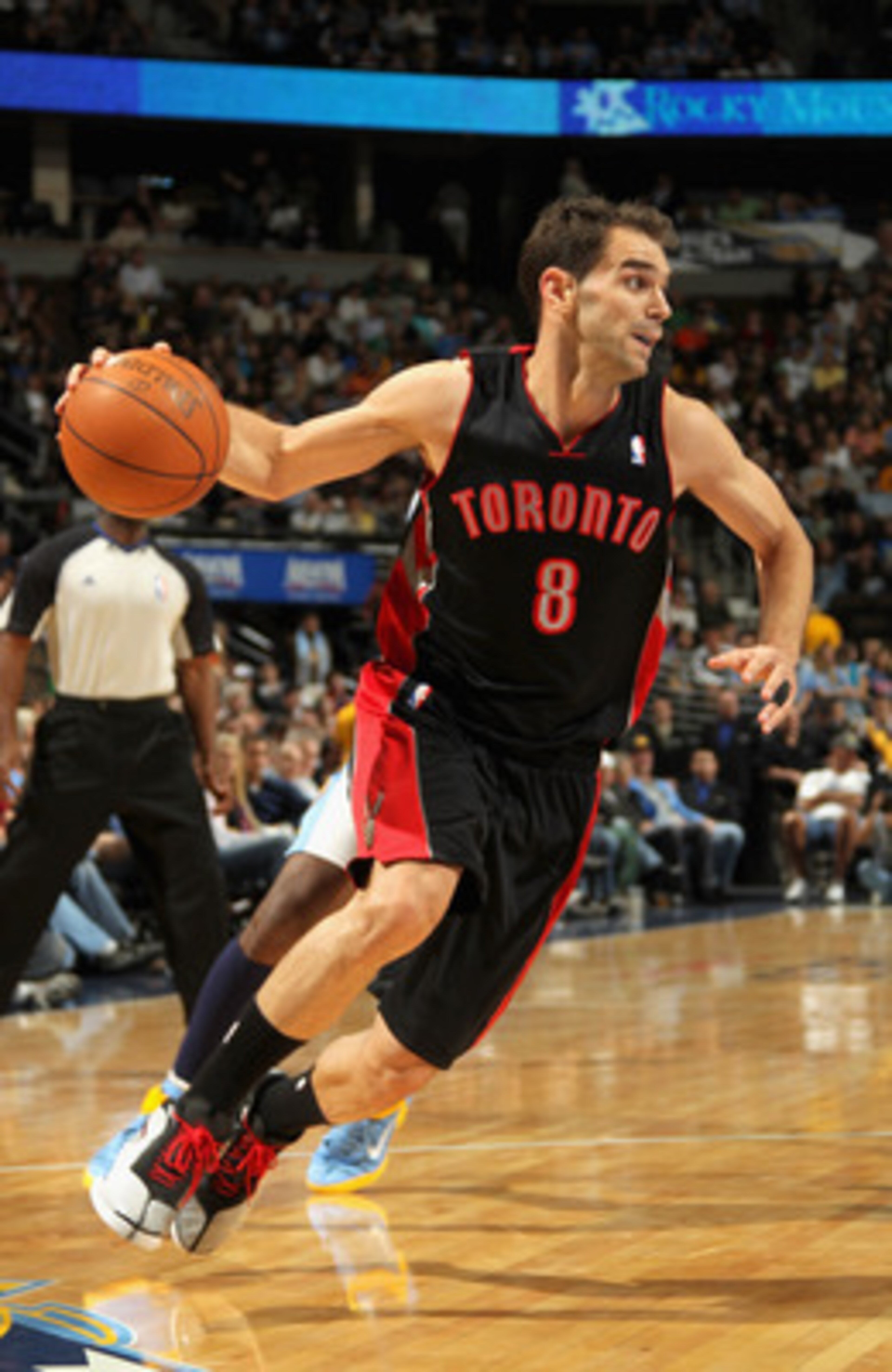 DENVER, CO - MARCH 21: Jose Calderon #8 of the Toronto Raptors drives to the basket against the Denver Nuggets at the Pepsi Center on March 21, 2011 in Denver, Colorado. The Nuggets defeated the Raptors 123-90. NOTE TO USER: User expressly acknowledges a DENVER, CO - MARCH 21: Jose Calderon #8 of the Toronto Raptors drives to the basket against the Denver Nuggets at the Pepsi Center on March 21, 2011 in Denver, Colorado. The Nuggets defeated the Raptors 123-90. NOTE TO USER: User expressly acknowledges a