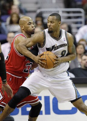 WASHINGTON, DC - FEBRUARY 28: Taj Gibson #22 of the Chicago Bulls guards Rashard Lewis #9 of the Washington Wizards at the Verizon Center in Washington on February 28, 2011 in Washington, DC. NOTE TO USER: User expressly acknowledges and agrees that, by d