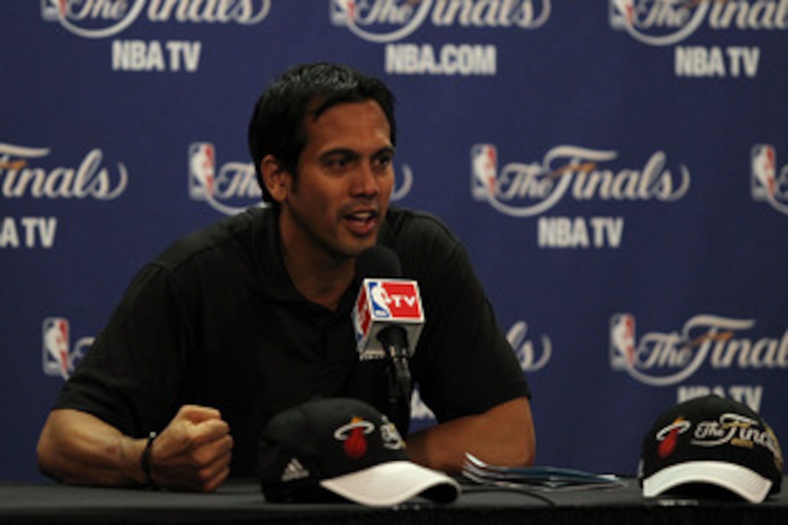 MIAMI, FL - JUNE 11:  Head coach Erik Spoelstra of the Miami Heat answers questions from the media during practice prior to Game 6 of the 2011 NBA Finals against the Dallas Mavericks at the American Airlines Arena on June 11, 2011 in miami, Florida. Game