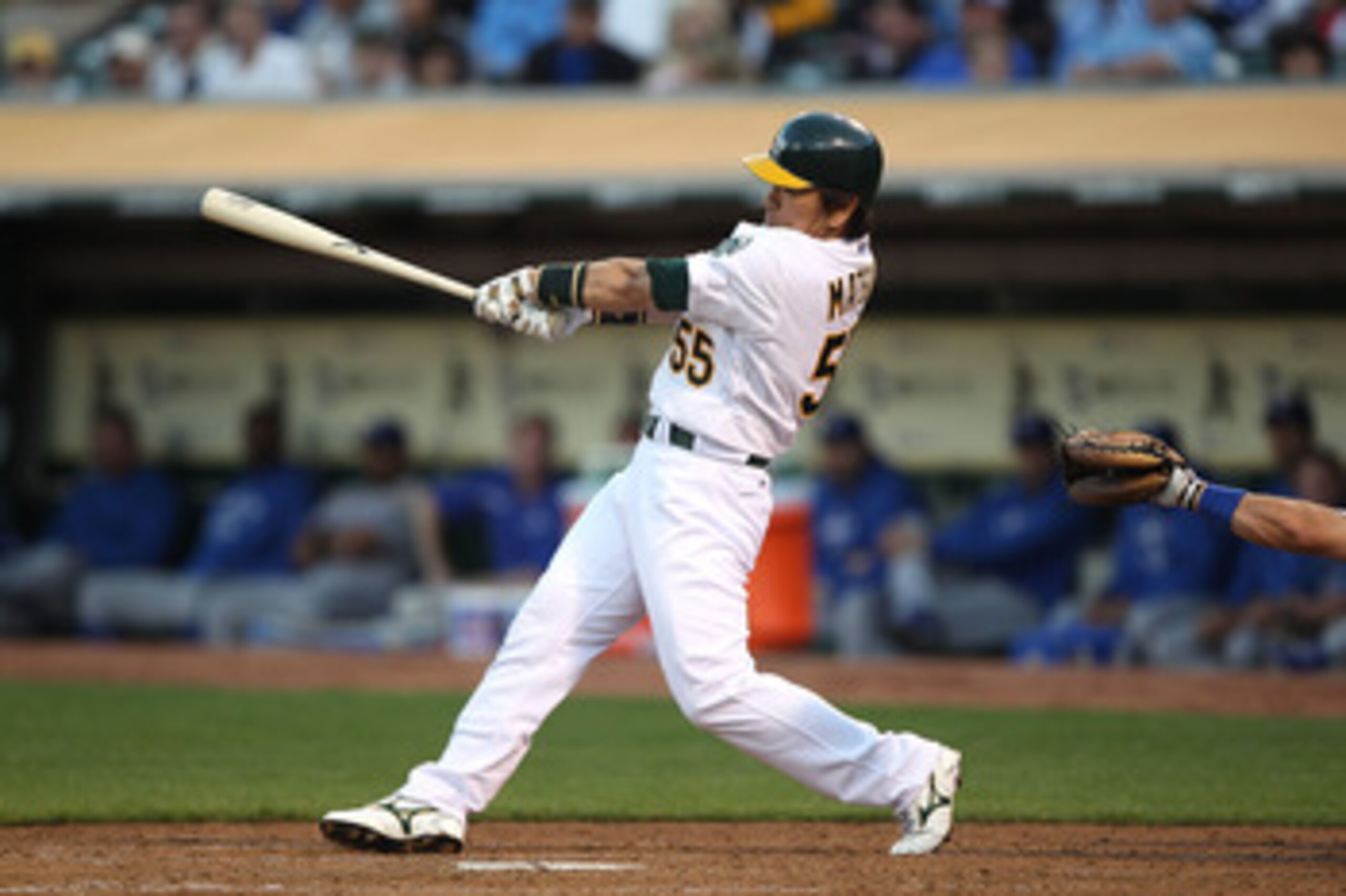 OAKLAND, CA - JUNE 14:  Hideki Matsui #55 of the Oakland Athletics hits a home run in the fourth inning against the Kansas City Royals at the Oakland-Alameda County Coliseum on June 14, 2011 in Oakland, California.  (Photo by Jed Jacobsohn/Getty Images)
