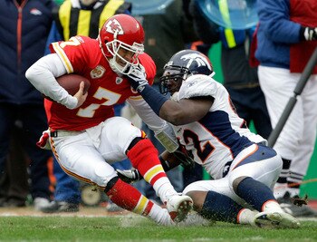KANSAS CITY, MO - DECEMBER 06:  Quarterback Matt Cassel #7 of the Kansas City Chiefs is sacked by Elvis Dumervil #92 of the Denver Broncos during the game on December 6, 2009 at Arrowhead Stadium in Kansas City, Missouri.  (Photo by Jamie Squire/Getty Ima