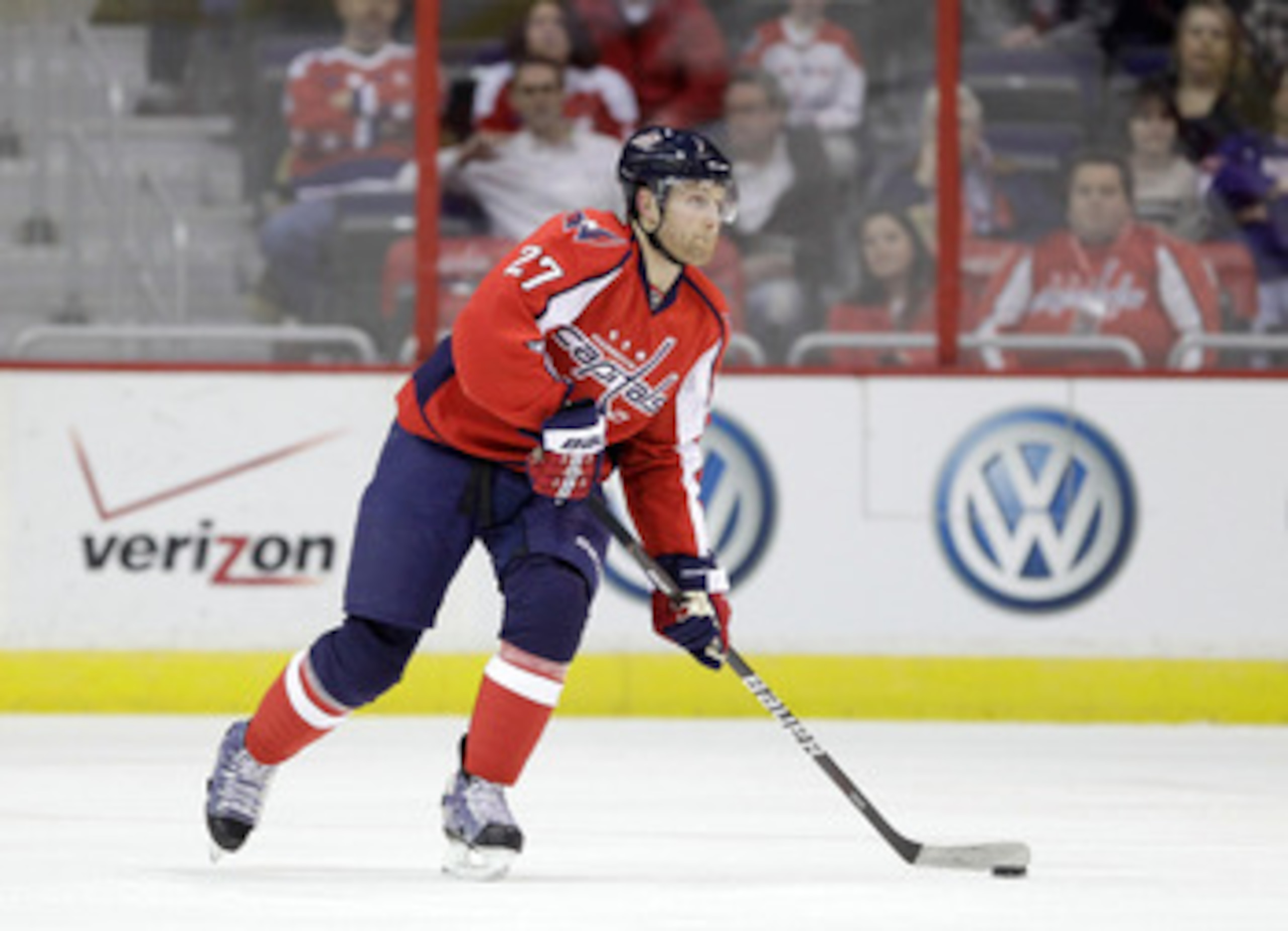 WASHINGTON, DC - MARCH 29:  Karl Alzner #27 of the Washington Capitals skates with the puck against the Carolina Hurricanes at the Verizon Center on March 29, 2011 in Washington, DC.  (Photo by Rob Carr/Getty Images)