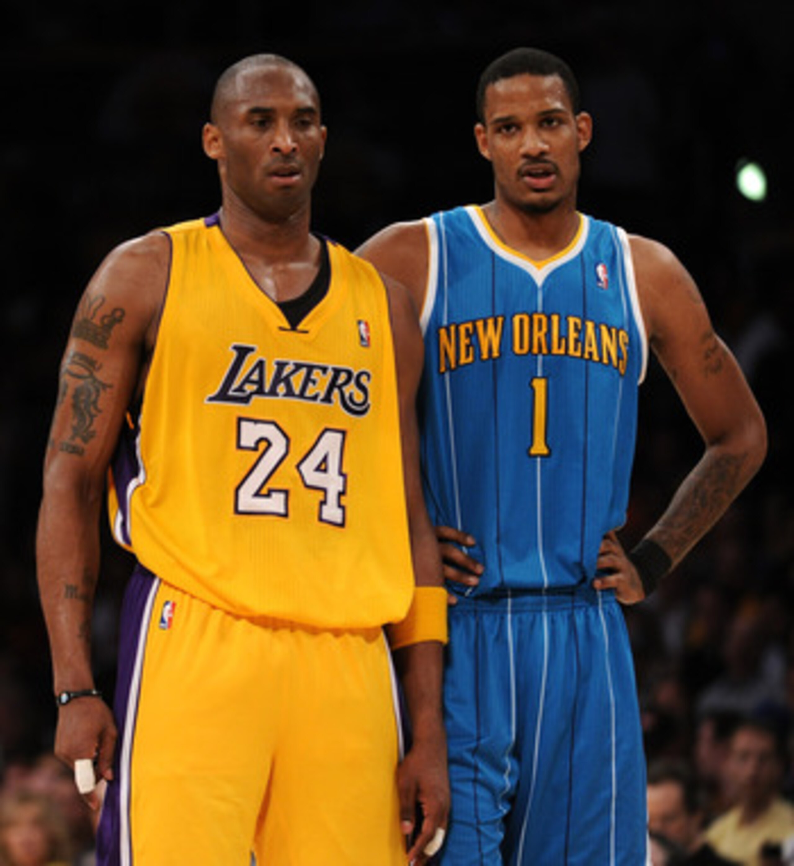 LOS ANGELES, CA - APRIL 26:  Kobe Bryant #24 of the Los Angeles Lakers stands with Trevor Ariza #1 of the New Orleans Hornets in Game Five of the Western Conference Quarterfinals in the 2011 NBA Playoffs on April 26, 2011 at Staples Center in Los Angeles,