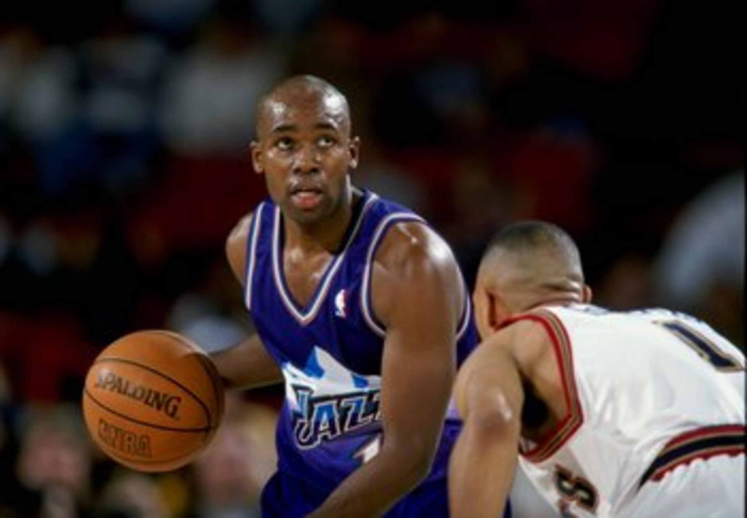 30 Dec 1997:  Kiwane Garris of the Utah Jazz in action against guard Jaque Vaughn of the Denver Nuggets during a game at the McNichols Sports Arena in Denver, Colorado. The Jazz defeated the Nuggets 132-99. Mandatory Credit: Brian Bahr  /Allsport