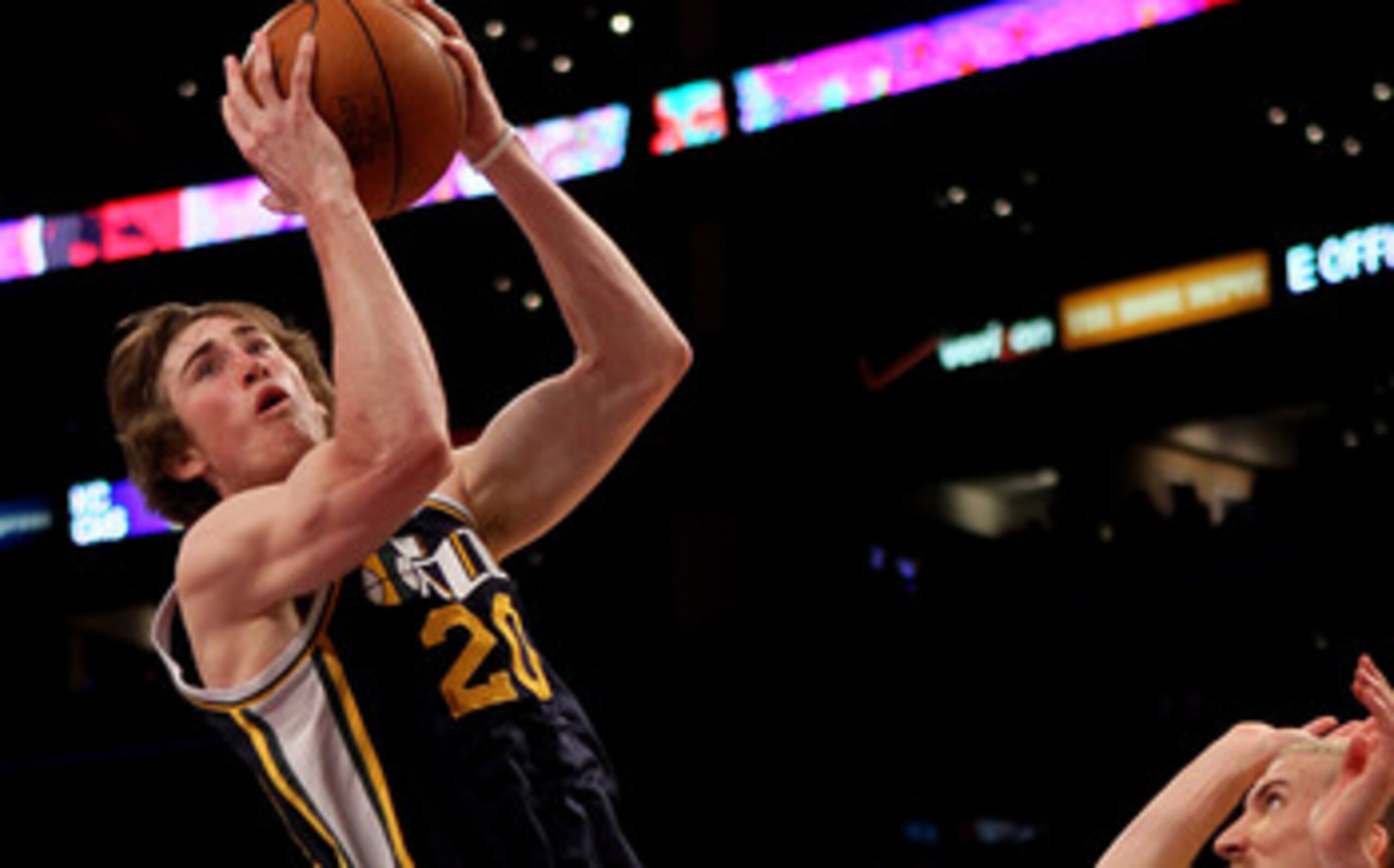 LOS ANGELES, CA - APRIL 05:  Gordon Hayward #20 of the Utah Jazz shoots over Steve Blake #5 of the Los Angeles Lakers at Staples Center on April 5, 2011 in Los Angeles, California. The Jazz won 86-85.  NOTE TO USER: User expressly acknowledges and agrees