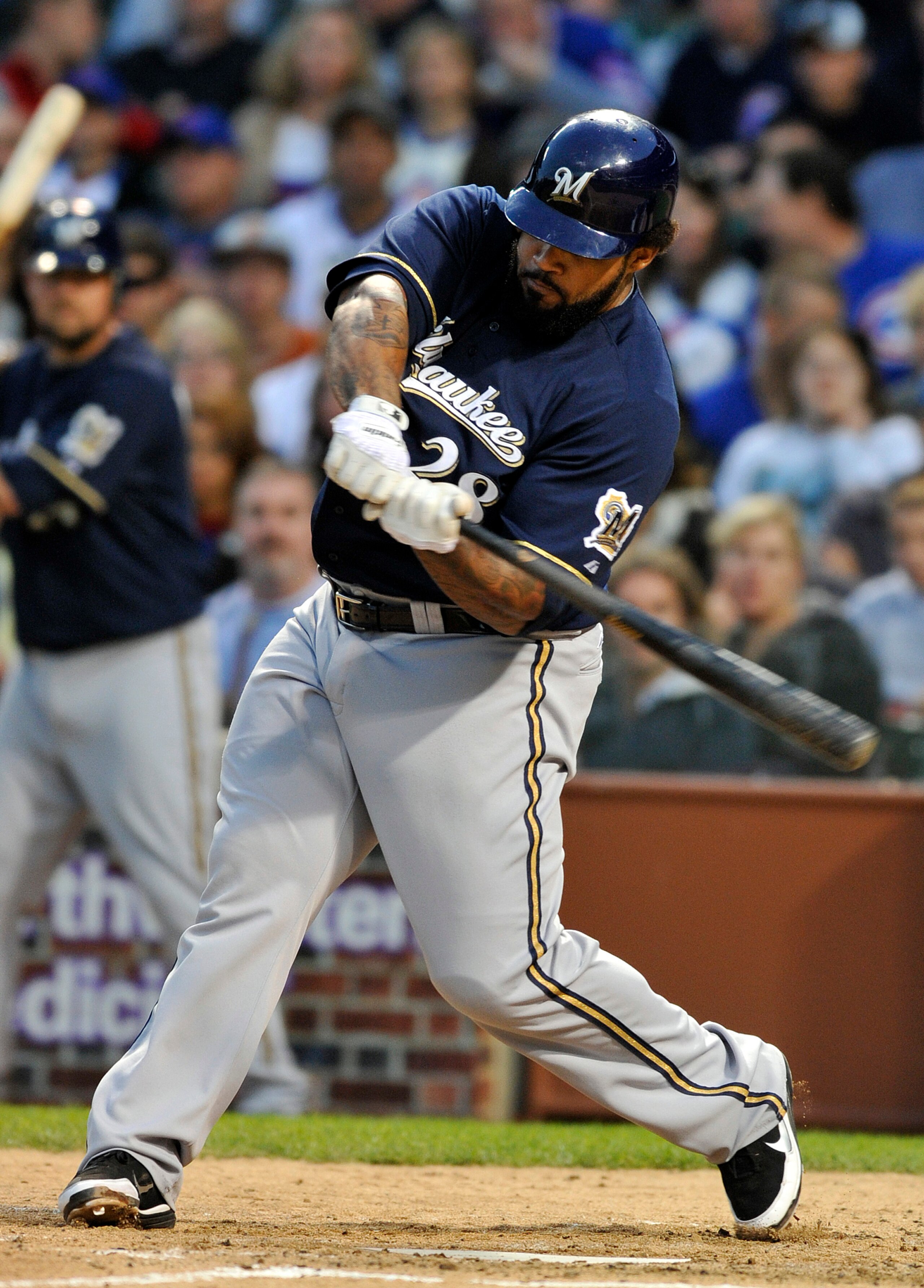 CHICAGO, IL - JUNE 13: Prince Fielder # 28 of the Milwaukee Brewers bats against the Chicago Cubs on June 13, 2011 at Wrigley Field in Chicago, Illinois.  The Cubs defeated the Brewers 1-0.  (Photo by David Banks/Getty Images)
