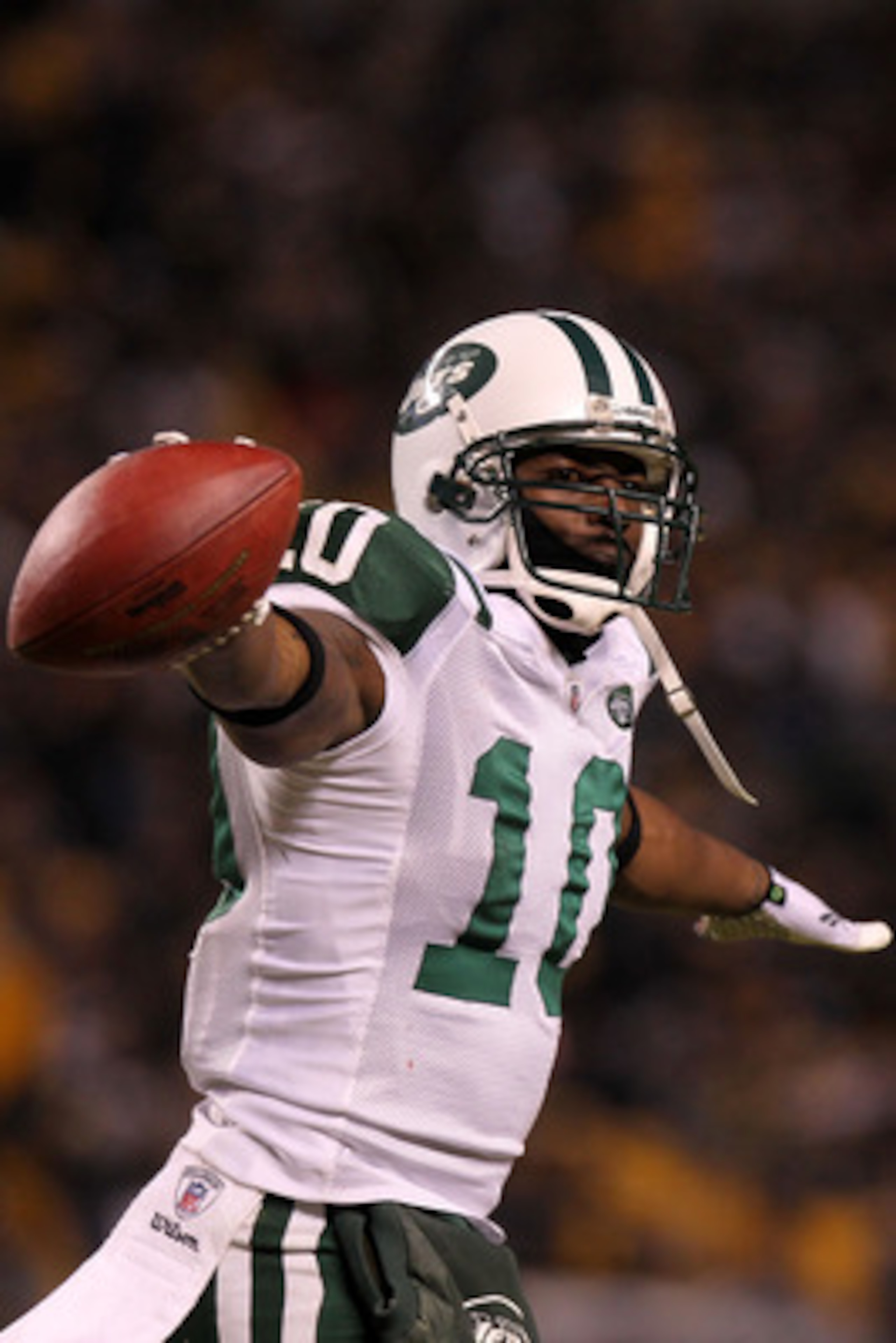 PITTSBURGH, PA - JANUARY 23: Santonio Holmes #10 of the New York Jets celebrates after he scored a third quarter touchdown against the Pittsburgh Steelers during the 2011 AFC Championship game at Heinz Field on January 23, 2011 in Pittsburgh, Pennsylvani PITTSBURGH, PA - JANUARY 23: Santonio Holmes #10 of the New York Jets celebrates after he scored a third quarter touchdown against the Pittsburgh Steelers during the 2011 AFC Championship game at Heinz Field on January 23, 2011 in Pittsburgh, Pennsylvani