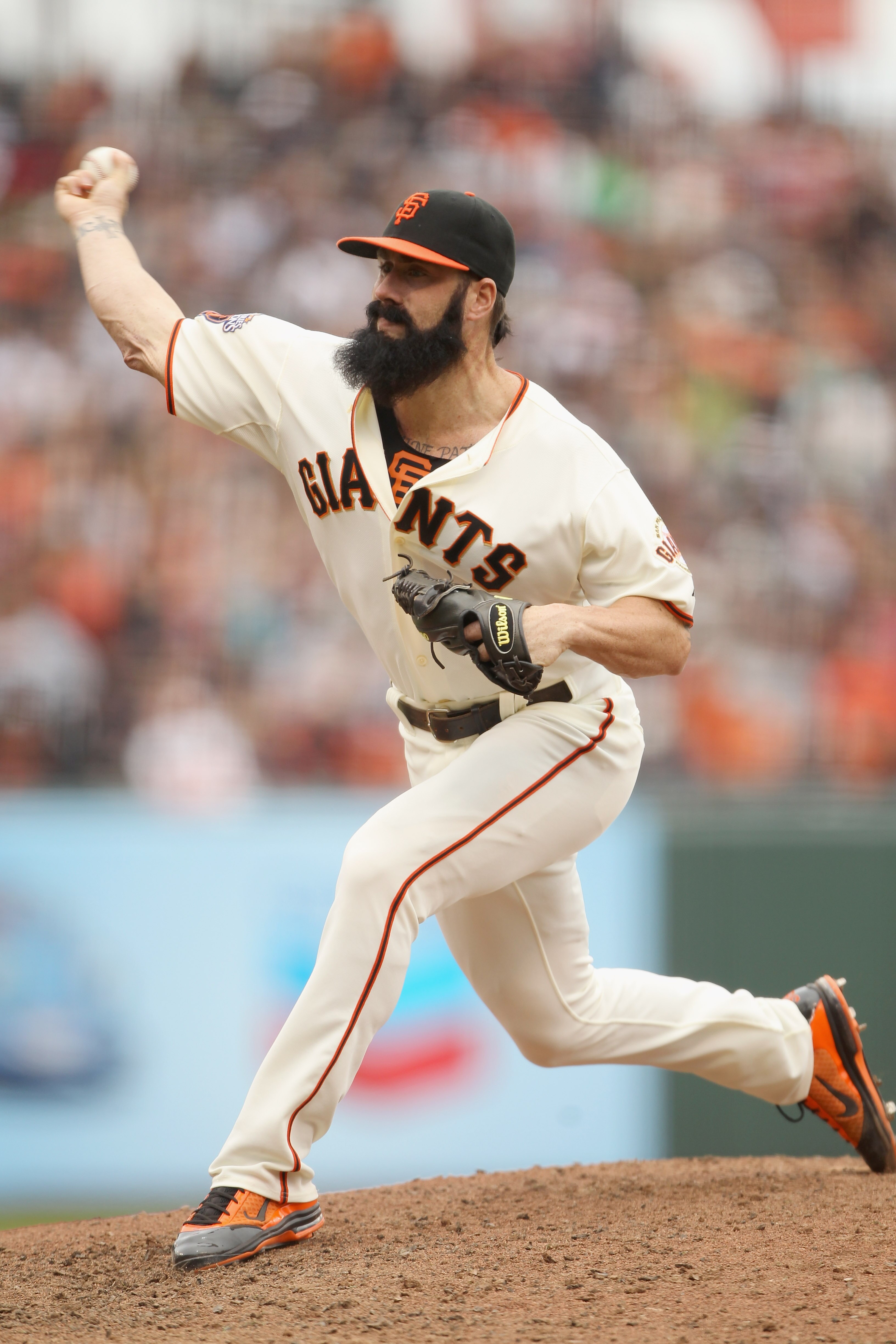 SAN FRANCISCO, CA - JUNE 05:  Brian Wilson #38 of the San Francisco Giants pitches against the Colorado Rockies at AT&T Park on June 5, 2011 in San Francisco, California.  (Photo by Ezra Shaw/Getty Images)