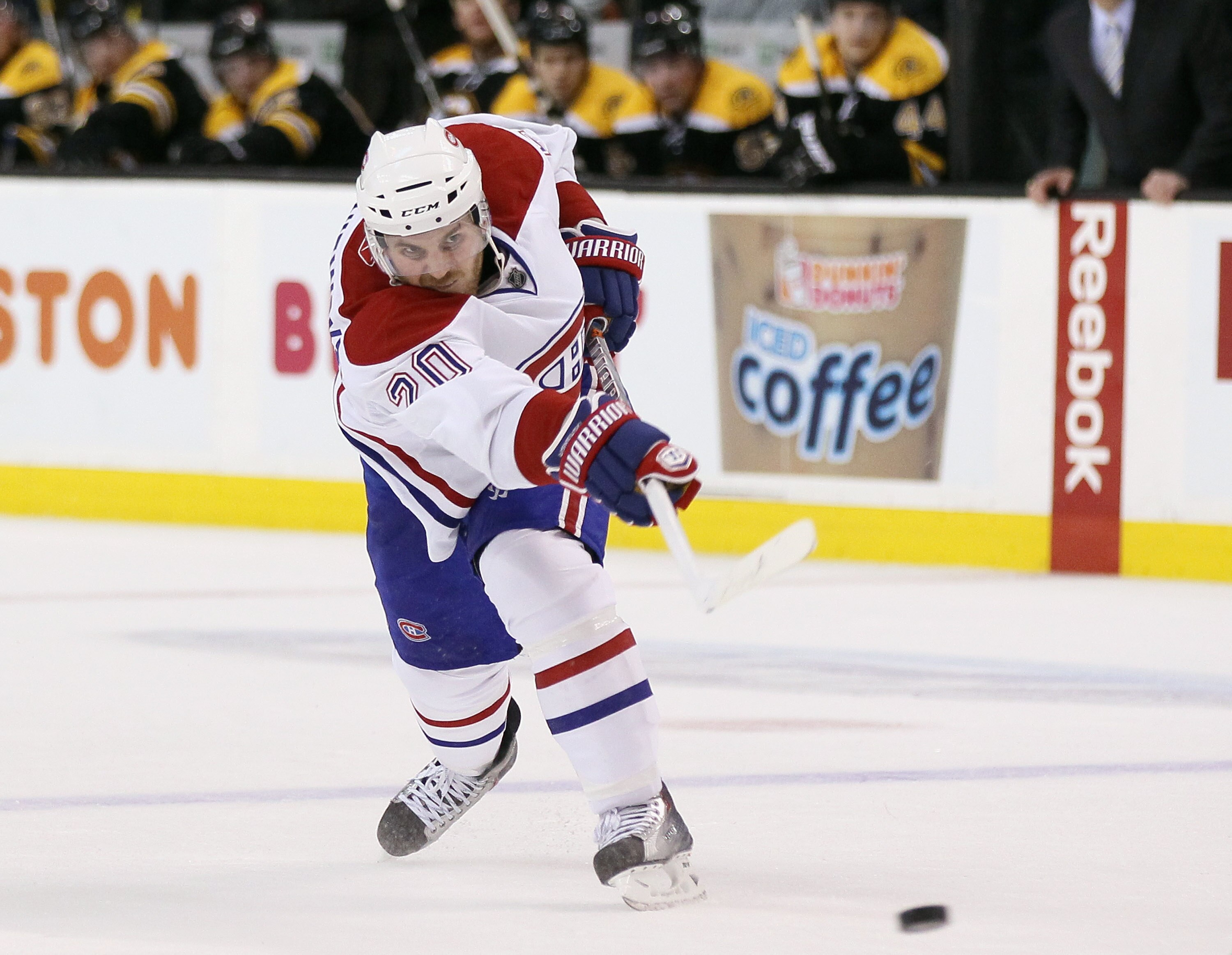 BOSTON, MA - FEBRUARY 09:  James Wisniewski #20 of the Montreal Canadiens takes a shot in the second period against the Boston Bruins on February 9, 2011 at the TD Garden in Boston, Massachusetts.  The Bruins defeated the Canadiens 8-6. (Photo by Elsa/Get