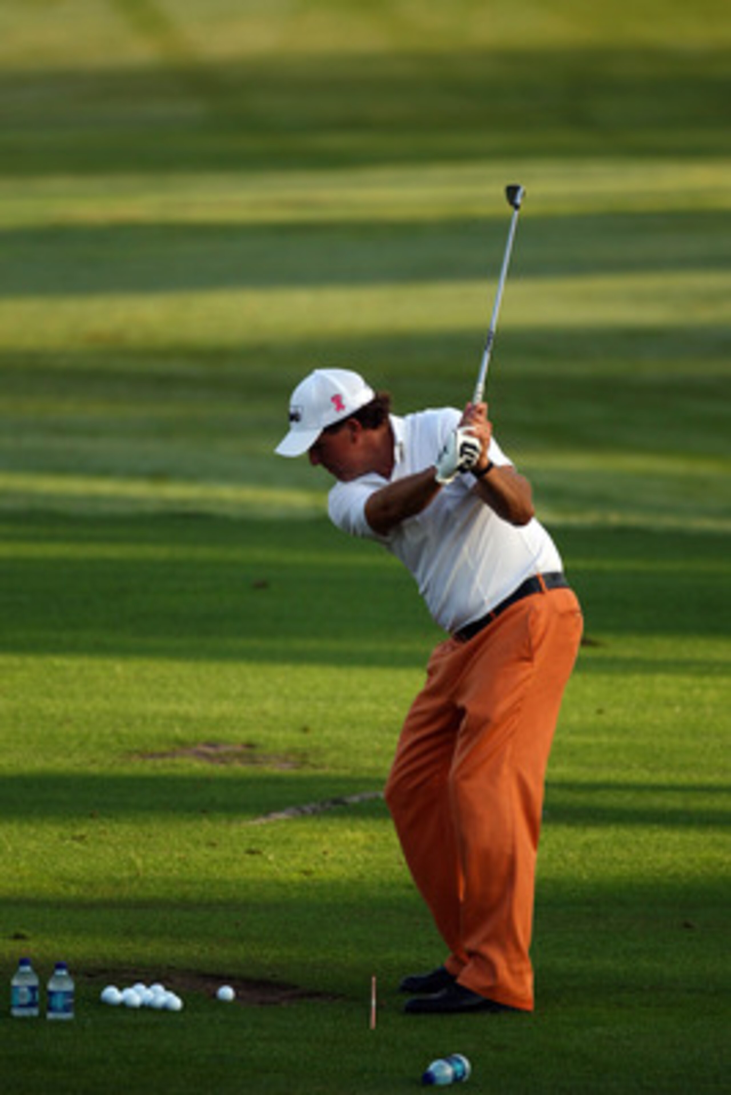 PONTE VEDRA BEACH, FL - MAY 05:  Phil Mickelson uses a pitching wedge on the practice range in swing sequence frame 7 of 12 during a practice round prior to the start of THE PLAYERS Championship held at THE PLAYERS Stadium course at TPC Sawgrass on May 5,