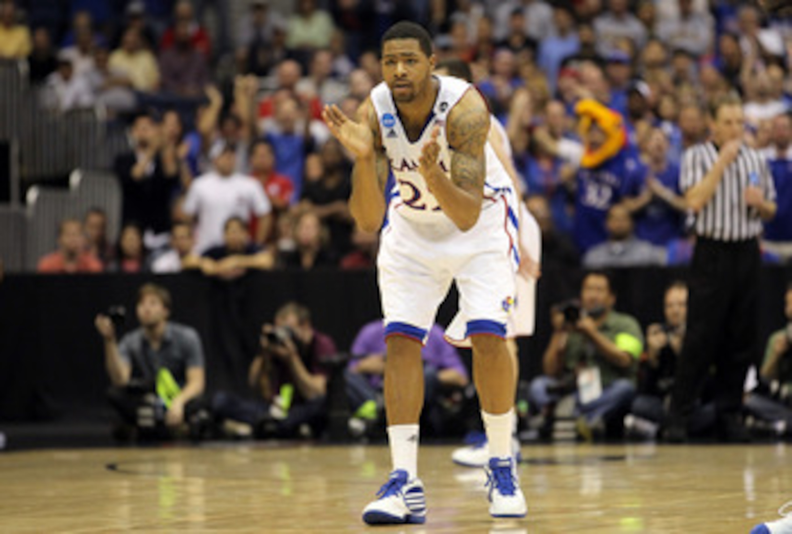 SAN ANTONIO, TX - MARCH 27:  Marcus Morris #22 of the Kansas Jayhawks reacts during the southwest regional final of the 2011 NCAA men's basketball tournament against the Virginia Commonwealth Rams at the Alamodome on March 27, 2011 in San Antonio, Texas.