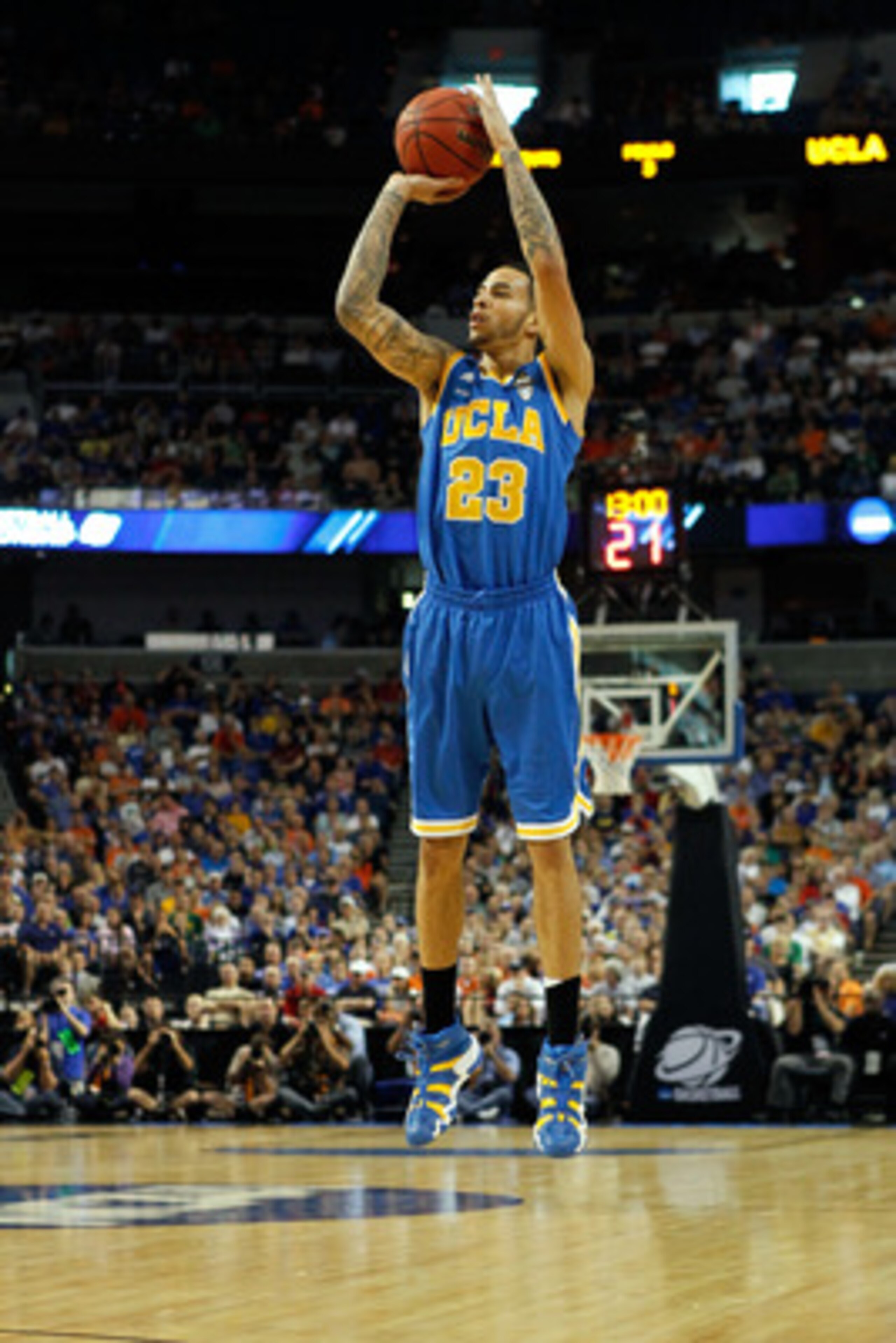 TAMPA, FL - MARCH 19:  Tyler Honeycutt #23 of the UCLA Bruins attempts a shot against the Florida Gators during the third round of the 2011 NCAA men's basketball tournament at St. Pete Times Forum on March 19, 2011 in Tampa, Florida.  (Photo by J. Meric/G