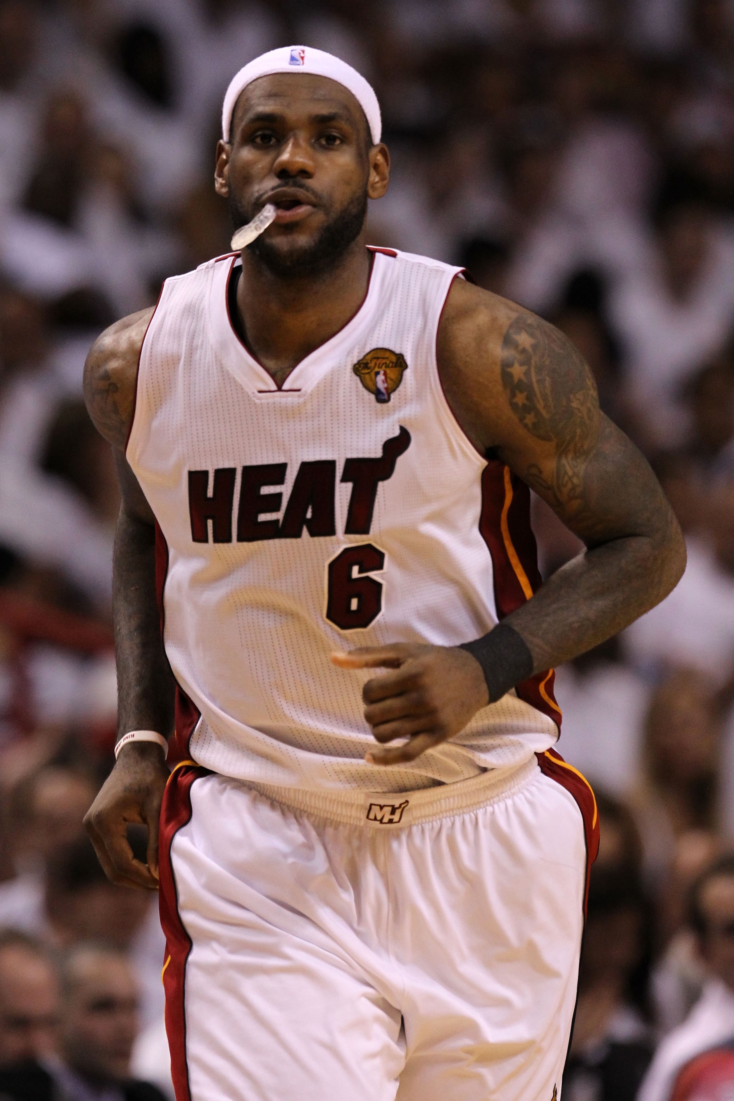 MIAMI, FL - JUNE 12: LeBron James #6 of the Miami Heat runs down court while taking on the Dallas Mavericks in Game Six of the 2011 NBA Finals at American Airlines Arena on June 12, 2011 in Miami, Florida. NOTE TO USER: User expressly acknowledges and ag MIAMI, FL - JUNE 12: LeBron James #6 of the Miami Heat runs down court while taking on the Dallas Mavericks in Game Six of the 2011 NBA Finals at American Airlines Arena on June 12, 2011 in Miami, Florida. NOTE TO USER: User expressly acknowledges and ag