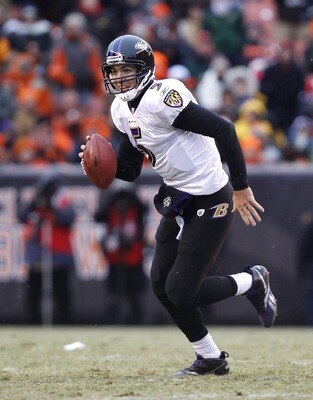 CLEVELAND - DECEMBER 26:  Quarterback Joe Flacco #5 of the Baltimore Ravens runs against the Cleveland Browns at Cleveland Browns Stadium on December 26, 2010 in Cleveland, Ohio.  (Photo by Matt Sullivan/Getty Images)