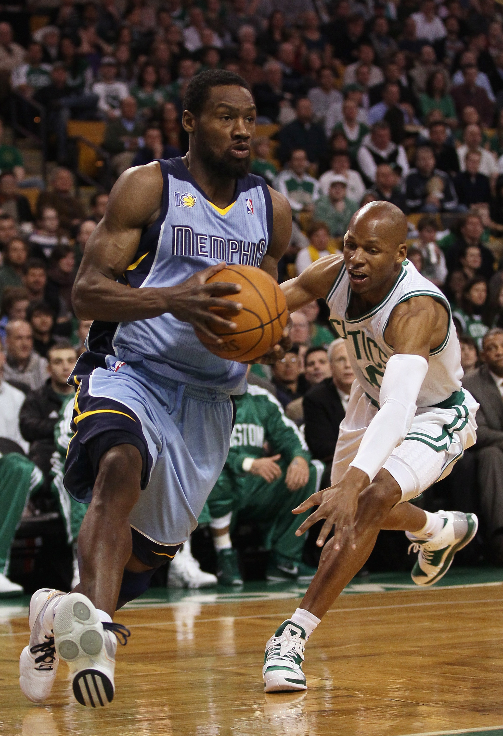 BOSTON, MA - MARCH 23:  Tony Allen #9 of the Memphis Grizzlies heads for the net as Ray Allen #20 of the Boston Celtics defends on March 23, 2011 at the TD Garden in Boston, Massachusetts.  NOTE TO USER: User expressly acknowledges and agrees that, by dow