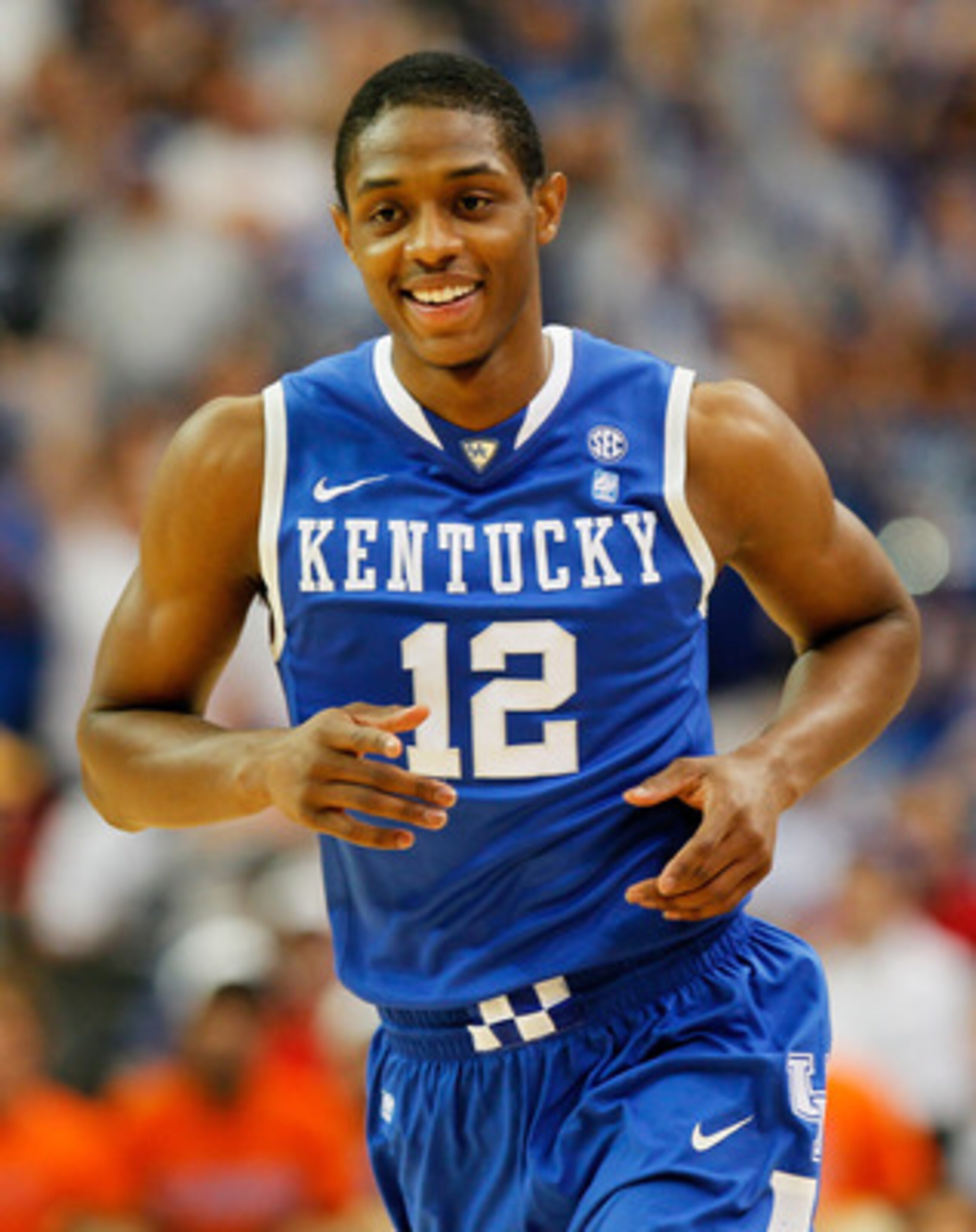 ATLANTA, GA - MARCH 13: Brandon Knight #12 of the Kentucky Wildcats celebrates during their 70 to 54 win over the Florida Gators in the championship game of the SEC Men's Basketball Tournament at Georgia Dome on March 13, 2011 in Atlanta, Georgia. (Phot ATLANTA, GA - MARCH 13: Brandon Knight #12 of the Kentucky Wildcats celebrates during their 70 to 54 win over the Florida Gators in the championship game of the SEC Men's Basketball Tournament at Georgia Dome on March 13, 2011 in Atlanta, Georgia. (Phot