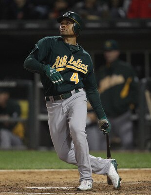 CHICAGO, IL - JUNE 10:  Coco Crisp #4 of the Oakland Athletics hits the ball against the Chicago White Sox at U.S. Cellular Field on June 10, 2011 in Chicago, Illinois. The Athletics defeated the White Sox 7-5.  (Photo by Jonathan Daniel/Getty Images)