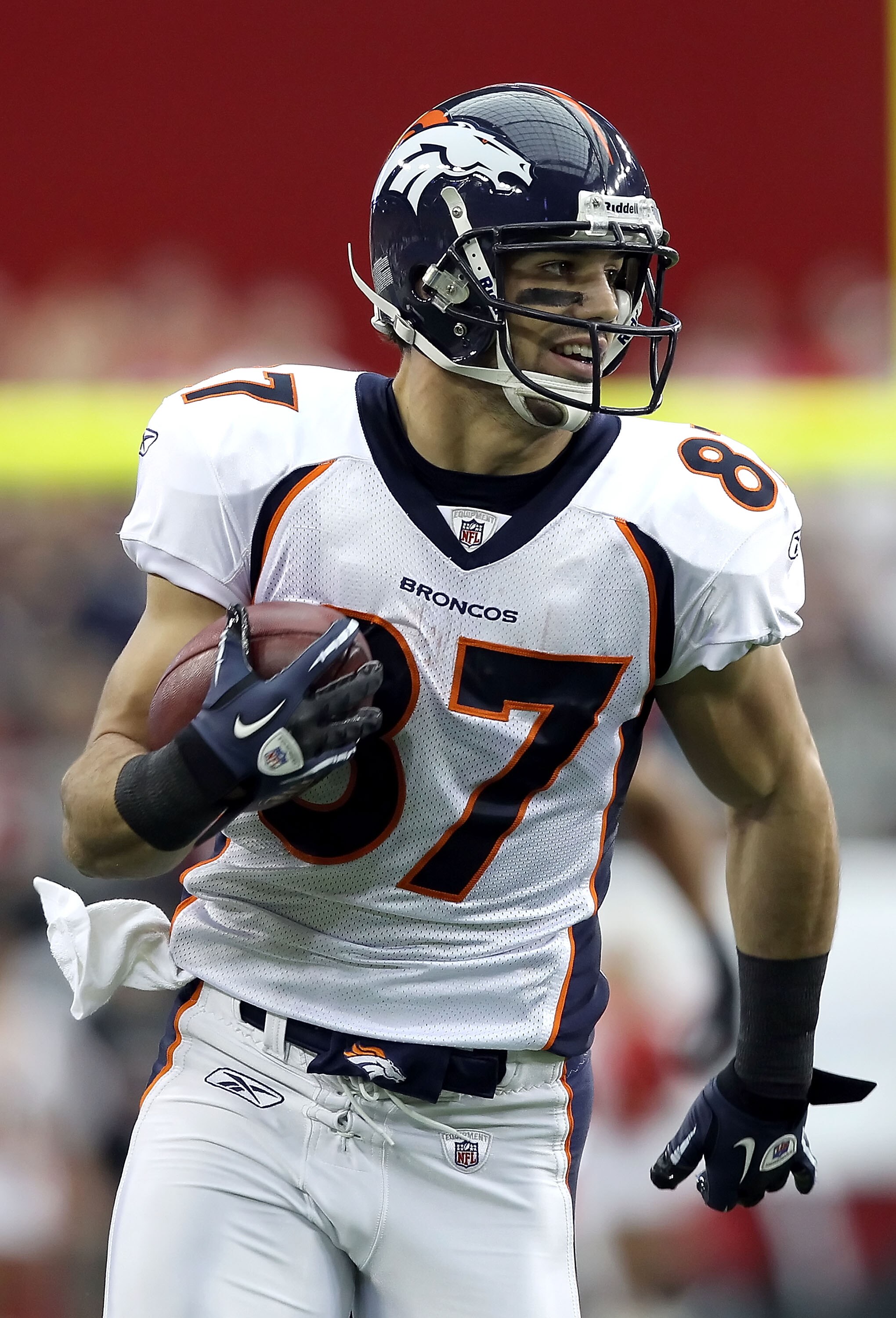 GLENDALE, AZ - DECEMBER 12:  Wide receiver Eric Decker #27 of the Denver Broncos runs with the football during the NFL game against the Arizona Cardinals at the University of Phoenix Stadium on December 12, 2010 in Glendale, Arizona.  The Cardinals defeat