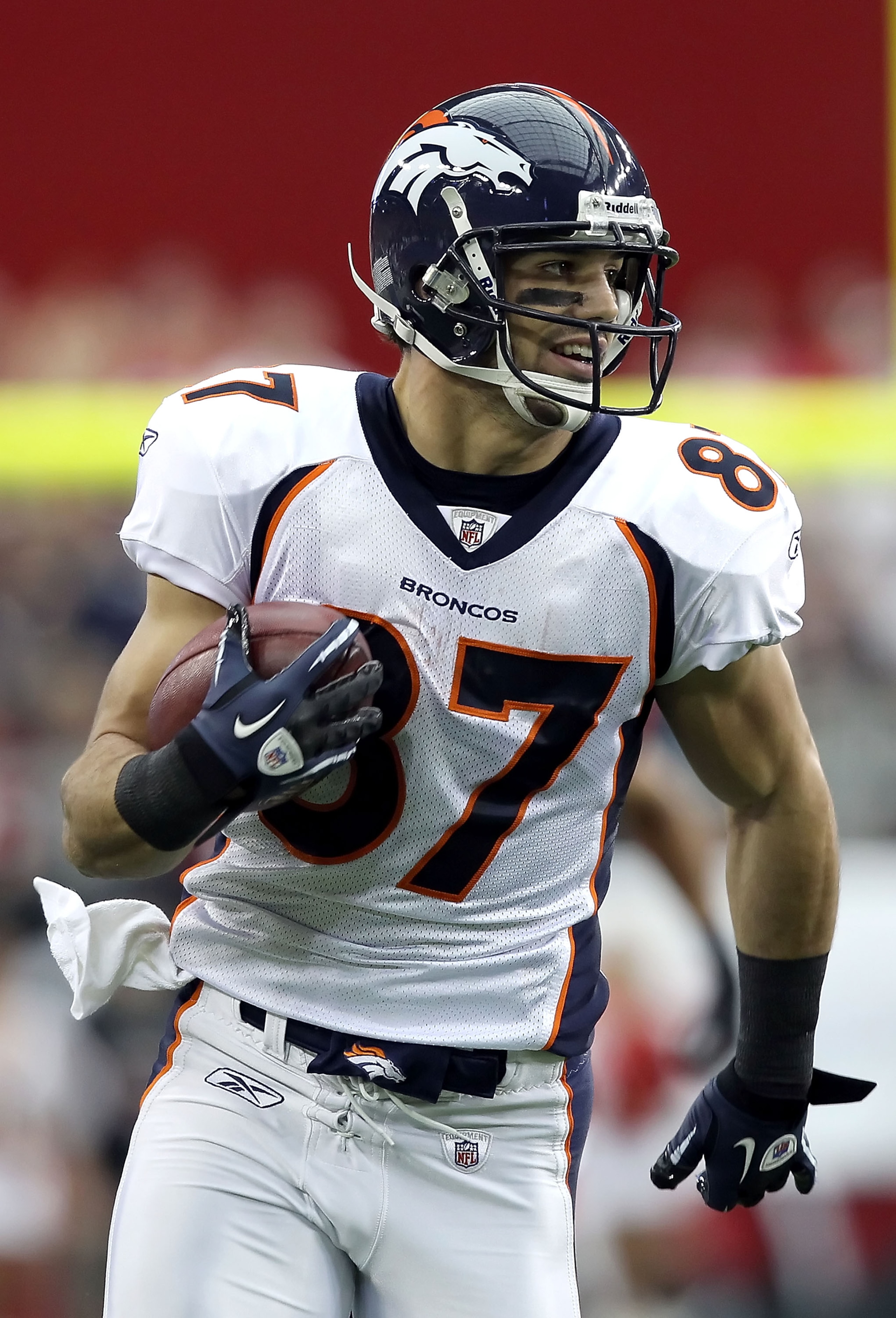 GLENDALE, AZ - DECEMBER 12:  Wide receiver Eric Decker #27 of the Denver Broncos runs with the football during the NFL game against the Arizona Cardinals at the University of Phoenix Stadium on December 12, 2010 in Glendale, Arizona.  The Cardinals defeat