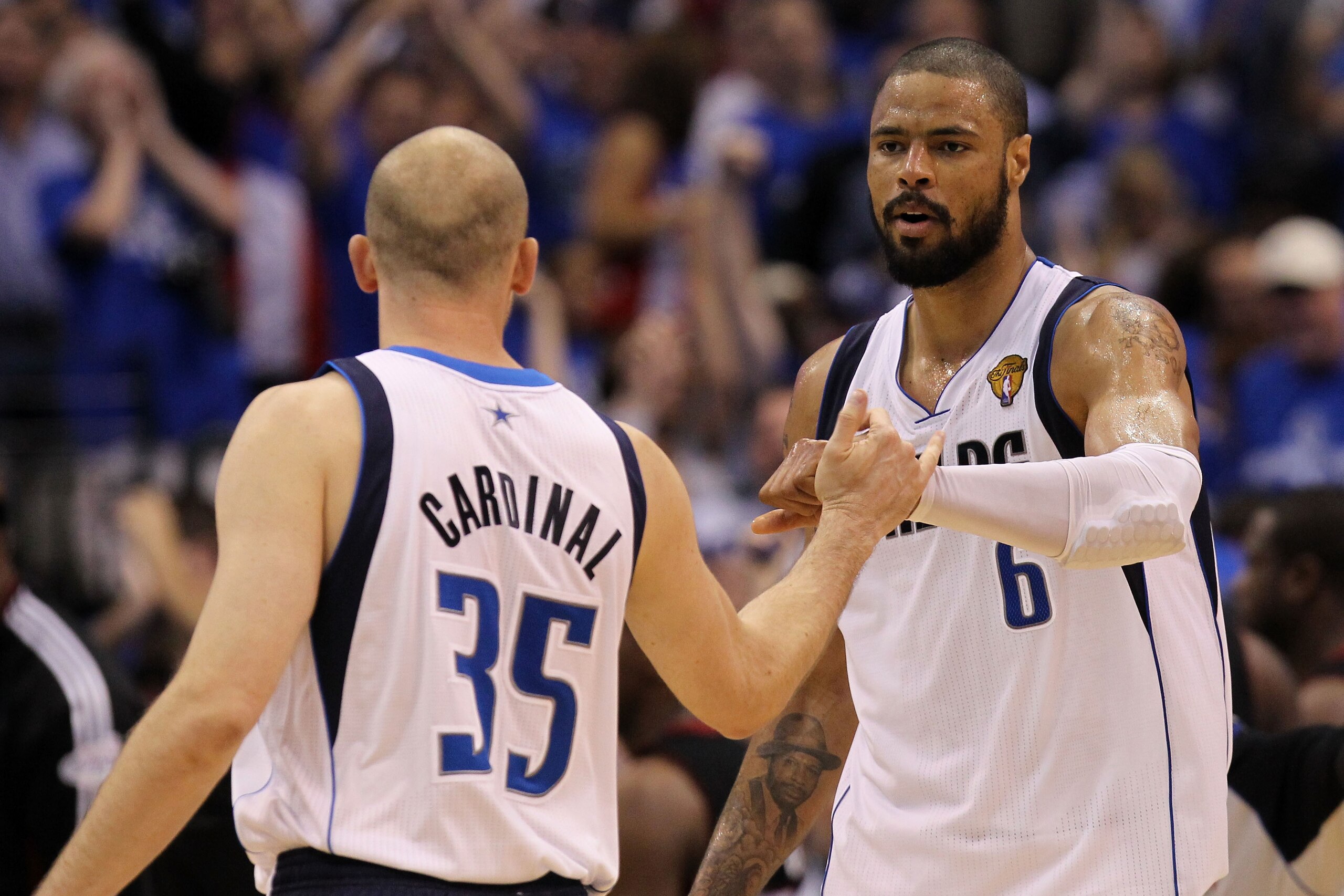 DALLAS, TX - JUNE 09:  Tyson Chandler #6 and Brian Cardinal #35 of the Dallas Mavericks react to a play against the Miami Heat in Game Five of the 2011 NBA Finals at American Airlines Center on June 9, 2011 in Dallas, Texas.  NOTE TO USER: User expressly