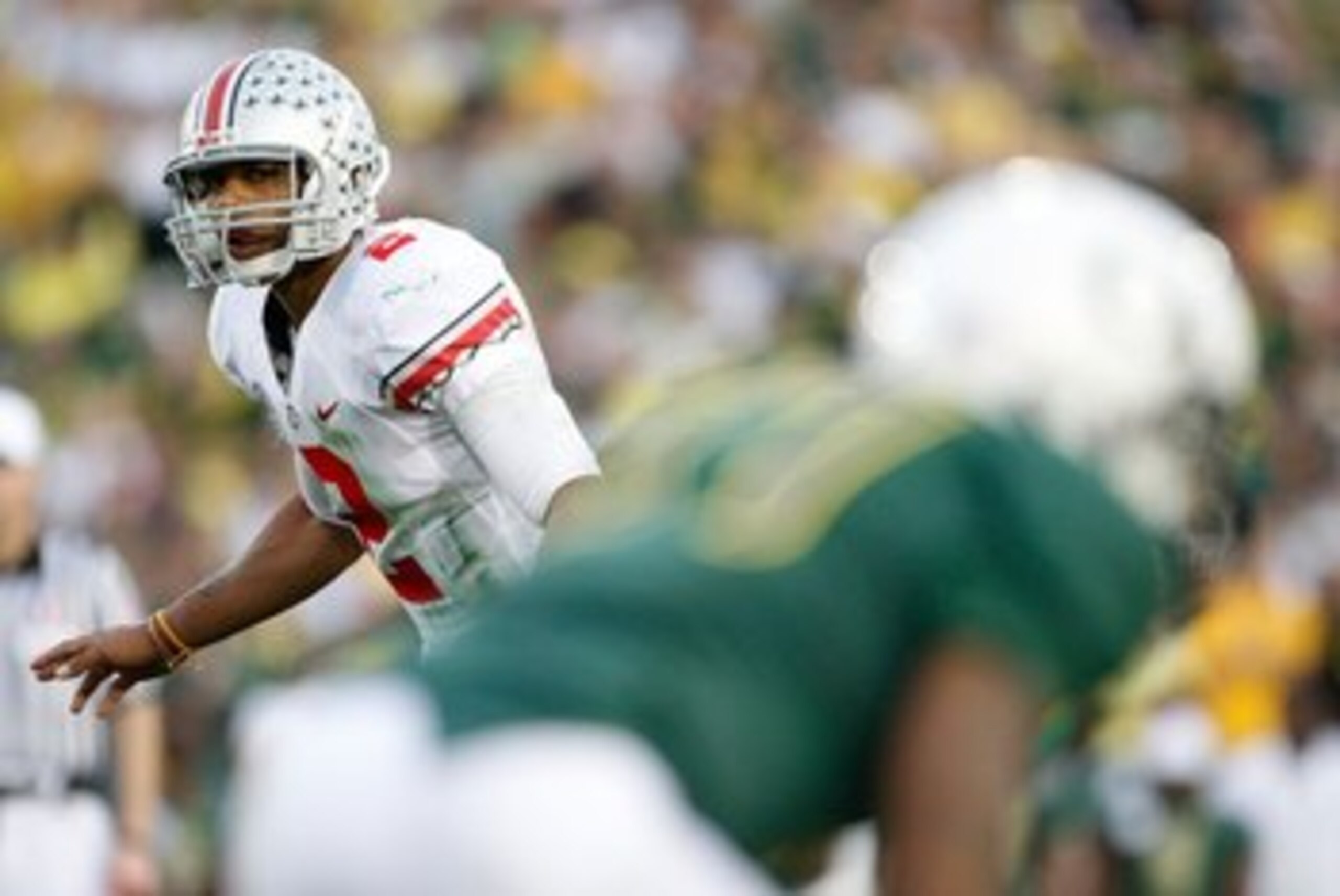 PASADENA, CA - JANUARY 01:  Quarterback Terrelle Pryor #2 of the Ohio State Buckeyes checks the coverage against the Oregon Ducks during the 96th Rose Bowl game on January 1, 2010 in Pasadena, California.  (Photo by Jeff Gross/Getty Images)