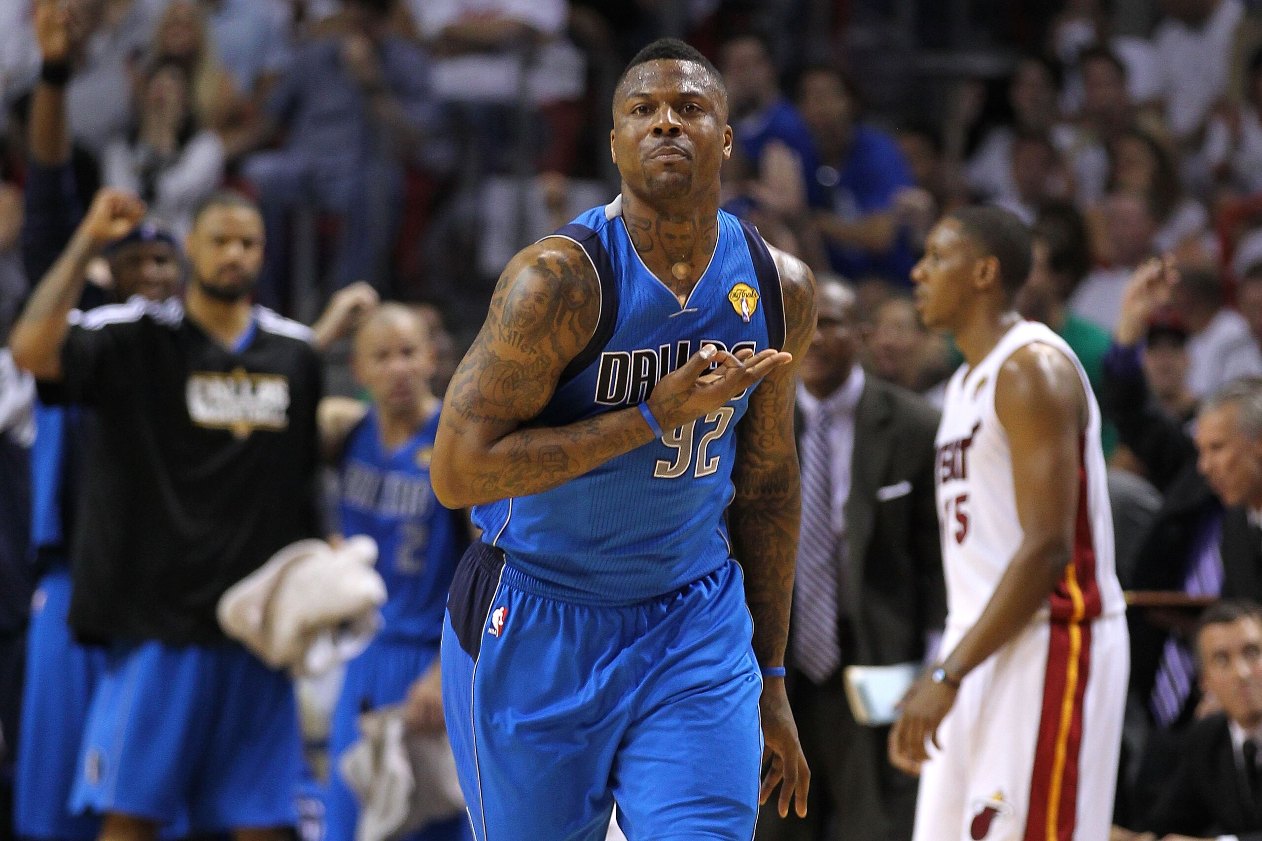 MIAMI, FL - JUNE 12:  DeShawn Stevenson #92 of the Dallas Mavericks celebrates after he made a 3-point shot in the first half against the Dallas Mavericks in Game Six of the 2011 NBA Finals at American Airlines Arena on June 12, 2011 in Miami, Florida. NO