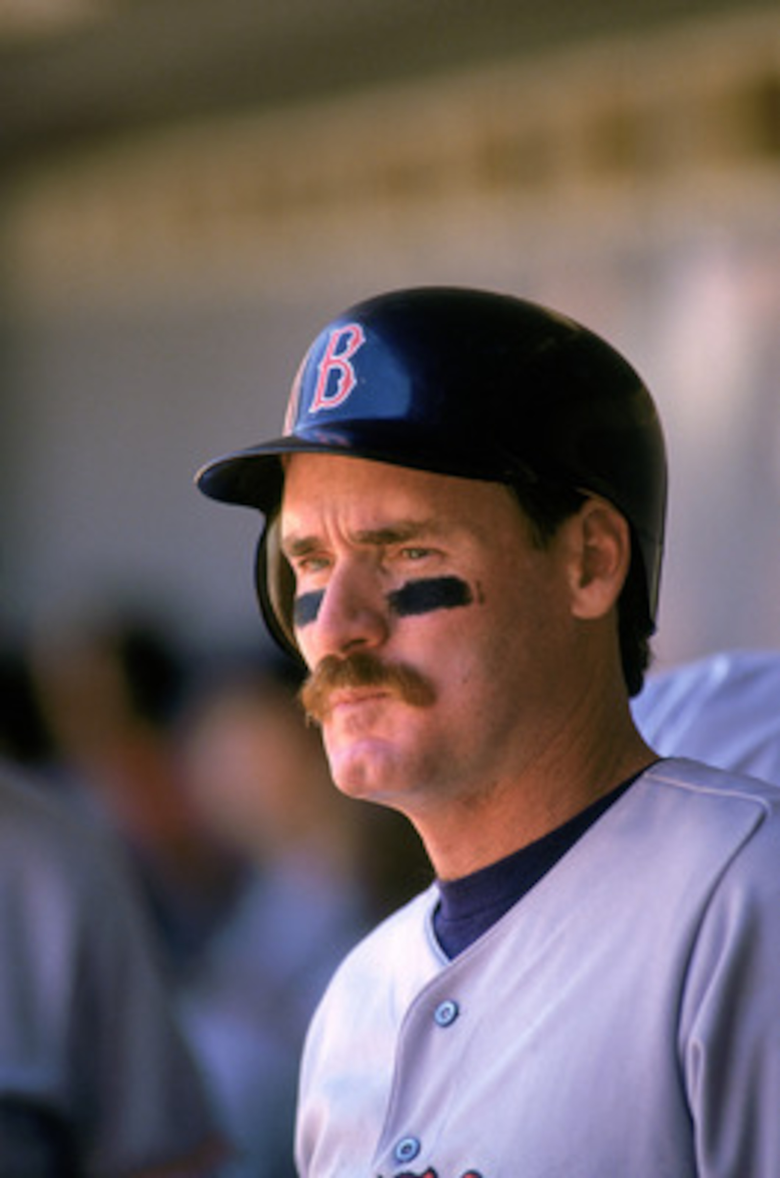 ANAHEIM, CA - 1991:   Wade Boggs #26 of the Boston Red Sox looks out of the dugout during a game against the California Angels in 1991 at Anaheim Stadium in Anaheim, California.  (Photo by: Ken Levine/Gettyimages)