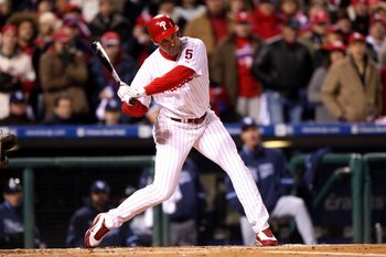PHILADELPHIA - OCTOBER 29:  Pat Burrell #5 of the Philadelphia Phillies hits a double in the top of the seventh inning against the Tampa Bay Rays during the continuation of game five of the 2008 MLB World Series on October 29, 2008 at Citizens Bank Park i