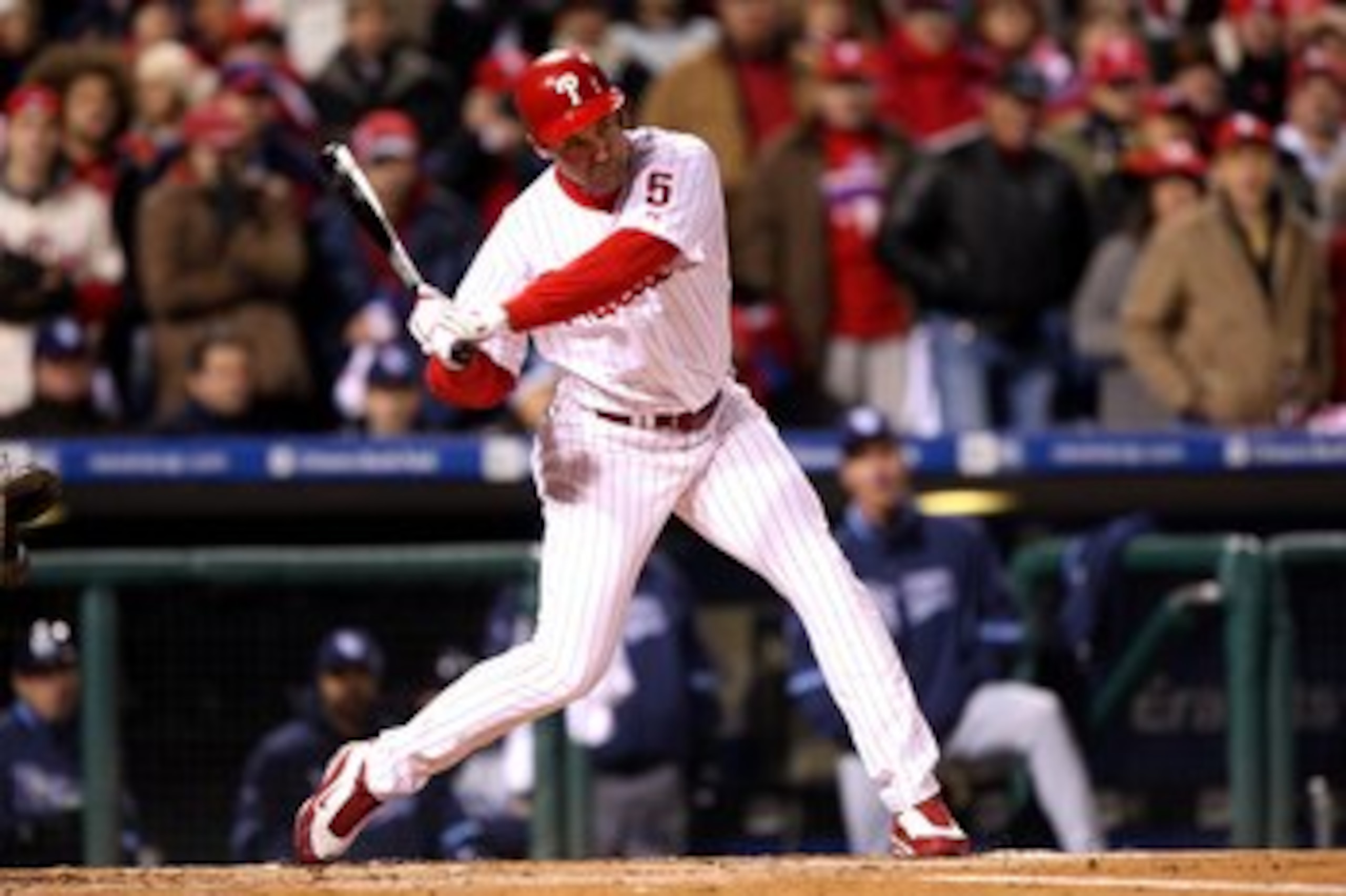 PHILADELPHIA - OCTOBER 29:  Pat Burrell #5 of the Philadelphia Phillies hits a double in the top of the seventh inning against the Tampa Bay Rays during the continuation of game five of the 2008 MLB World Series on October 29, 2008 at Citizens Bank Park i