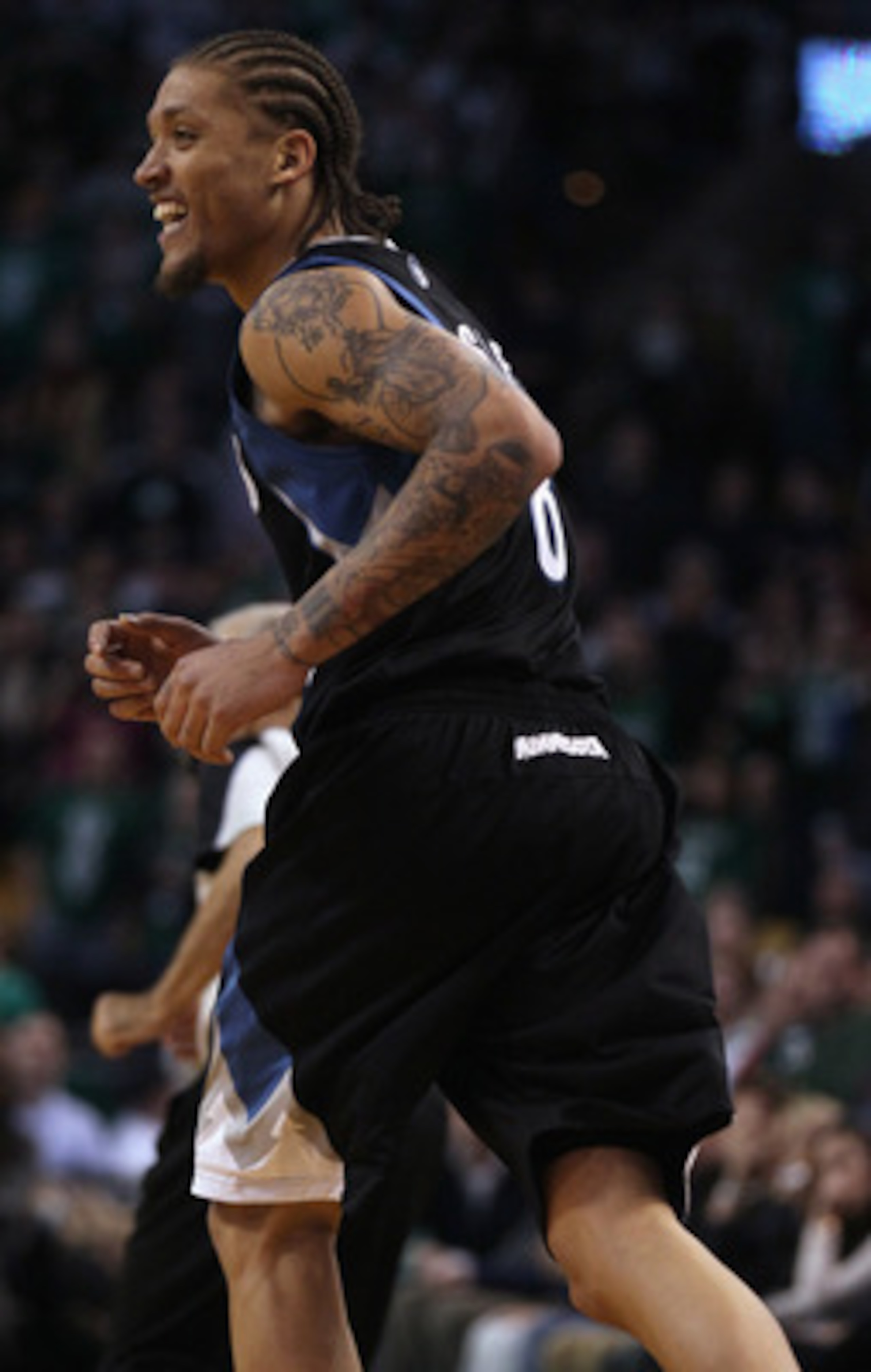 BOSTON, MA - JANUARY 03: Michael Beasley #8 of the Minnesota Timberwolves celebrates his three point shot in the fourth quarter against the Boston Celtics on January 3, 2011 at the TD Garden in Boston, Massachusetts. The Celtics defeated the Timberwolves BOSTON, MA - JANUARY 03: Michael Beasley #8 of the Minnesota Timberwolves celebrates his three point shot in the fourth quarter against the Boston Celtics on January 3, 2011 at the TD Garden in Boston, Massachusetts. The Celtics defeated the Timberwolves