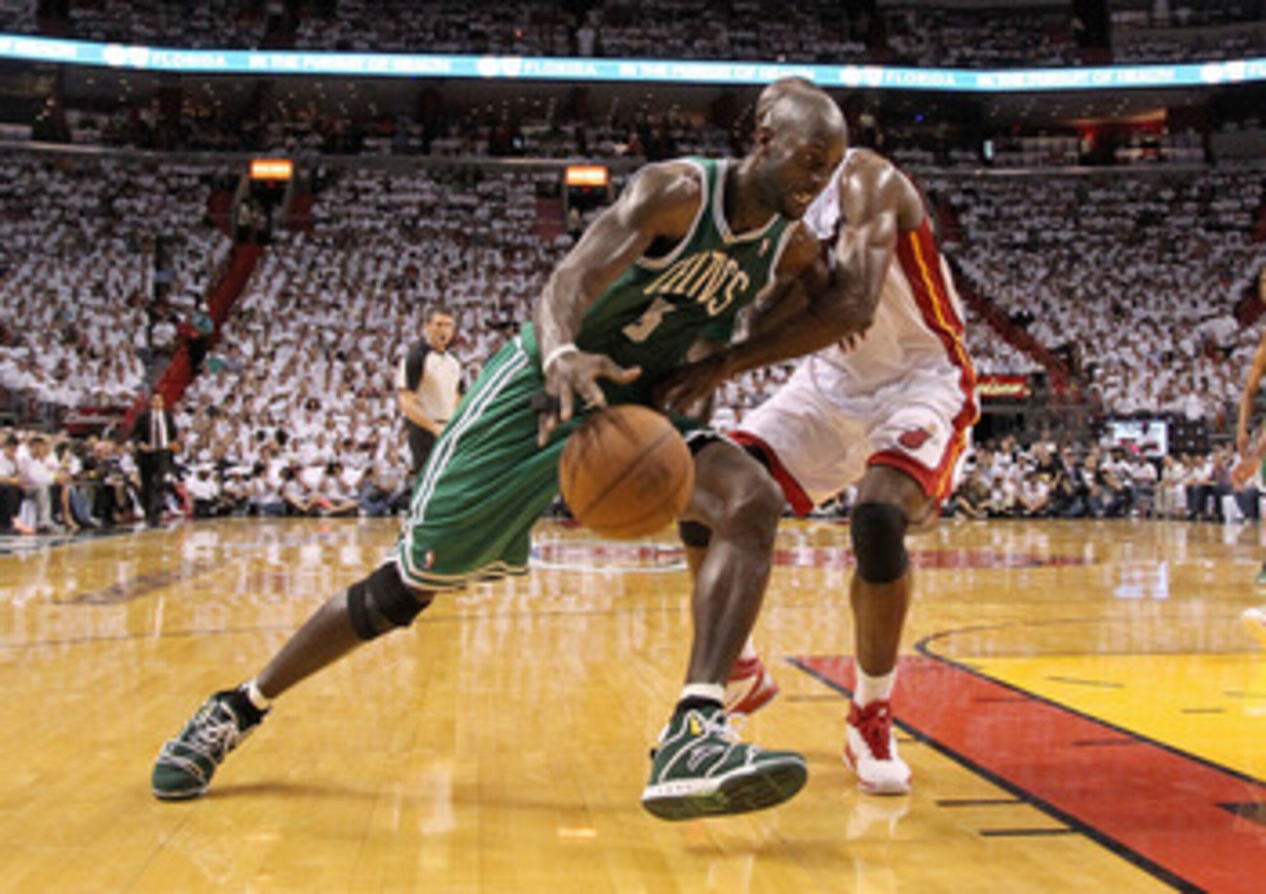 MIAMI, FL - MAY 11: Kevin Garnett #5 of the Boston Celtics drives against Joel Anthony #50 of the Miami Heat during Game Five of the Eastern Conference Semifinals of the 2011 NBA Playoffs at American Airlines Arena on May 11, 2011 in Miami, Florida. NOTE MIAMI, FL - MAY 11: Kevin Garnett #5 of the Boston Celtics drives against Joel Anthony #50 of the Miami Heat during Game Five of the Eastern Conference Semifinals of the 2011 NBA Playoffs at American Airlines Arena on May 11, 2011 in Miami, Florida. NOTE