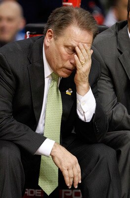 TAMPA, FL - MARCH 17:  Head coach Tom Izzo of the Michigan State Spartans covers his face on the bench against during the second round of the 2011 NCAA men's basketball tournament at St. Pete Times Forum on March 17, 2011 in Tampa, Florida.  (Photo by J. 