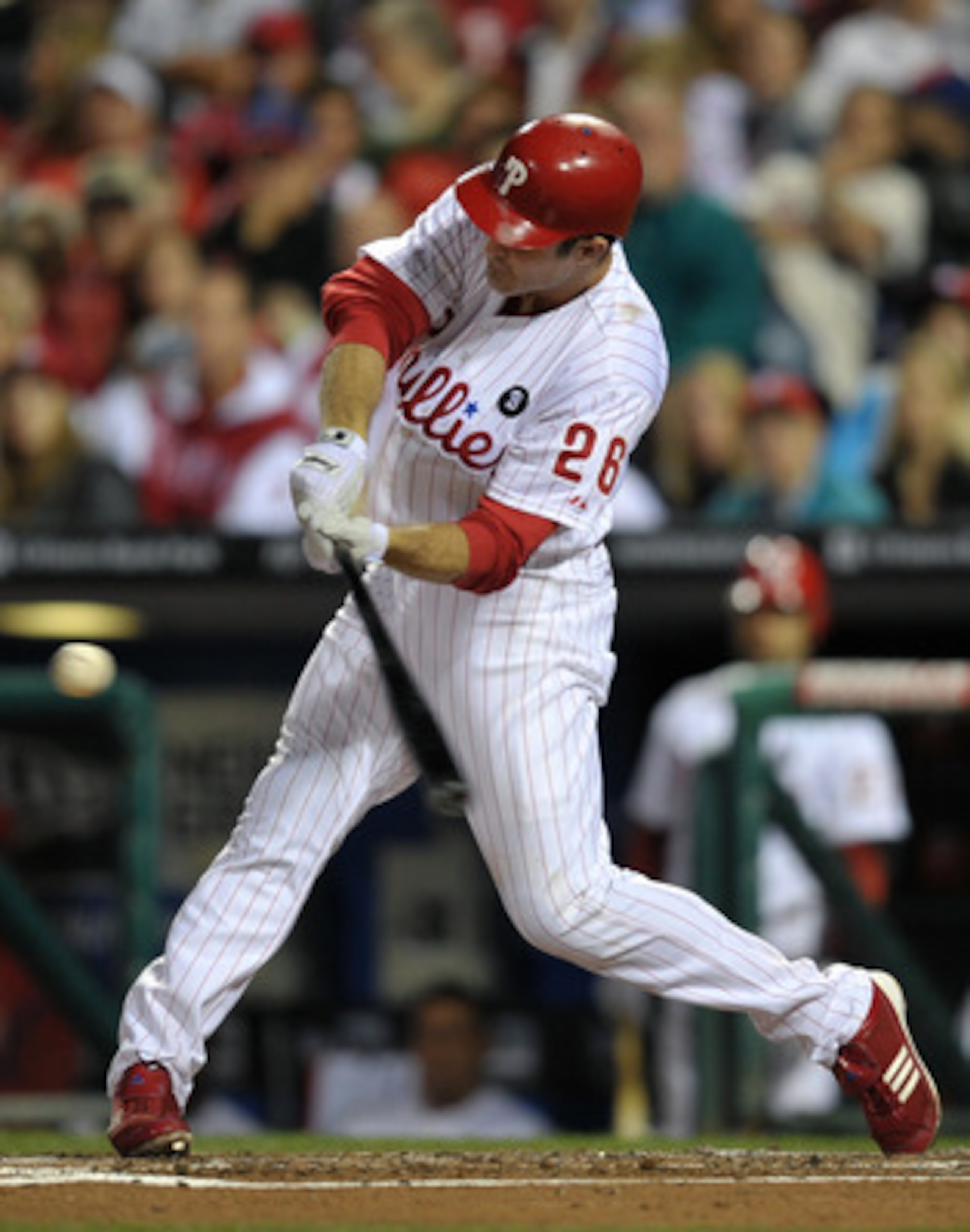 PHILADELPHIA, PA - JUNE 14: Chase Utley #26 of the Philadelphia Phillies hits a two run home-run in the bottom of the third inning during the game against the Florida Marlins at Citizens Bank Park on June 14, 2011 in Philadelphia, Pennsylvania. (Photo by 
