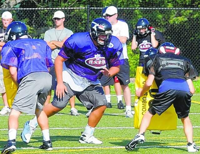 Believe it or not, Rob Havenstein (middle) is just a freshman.