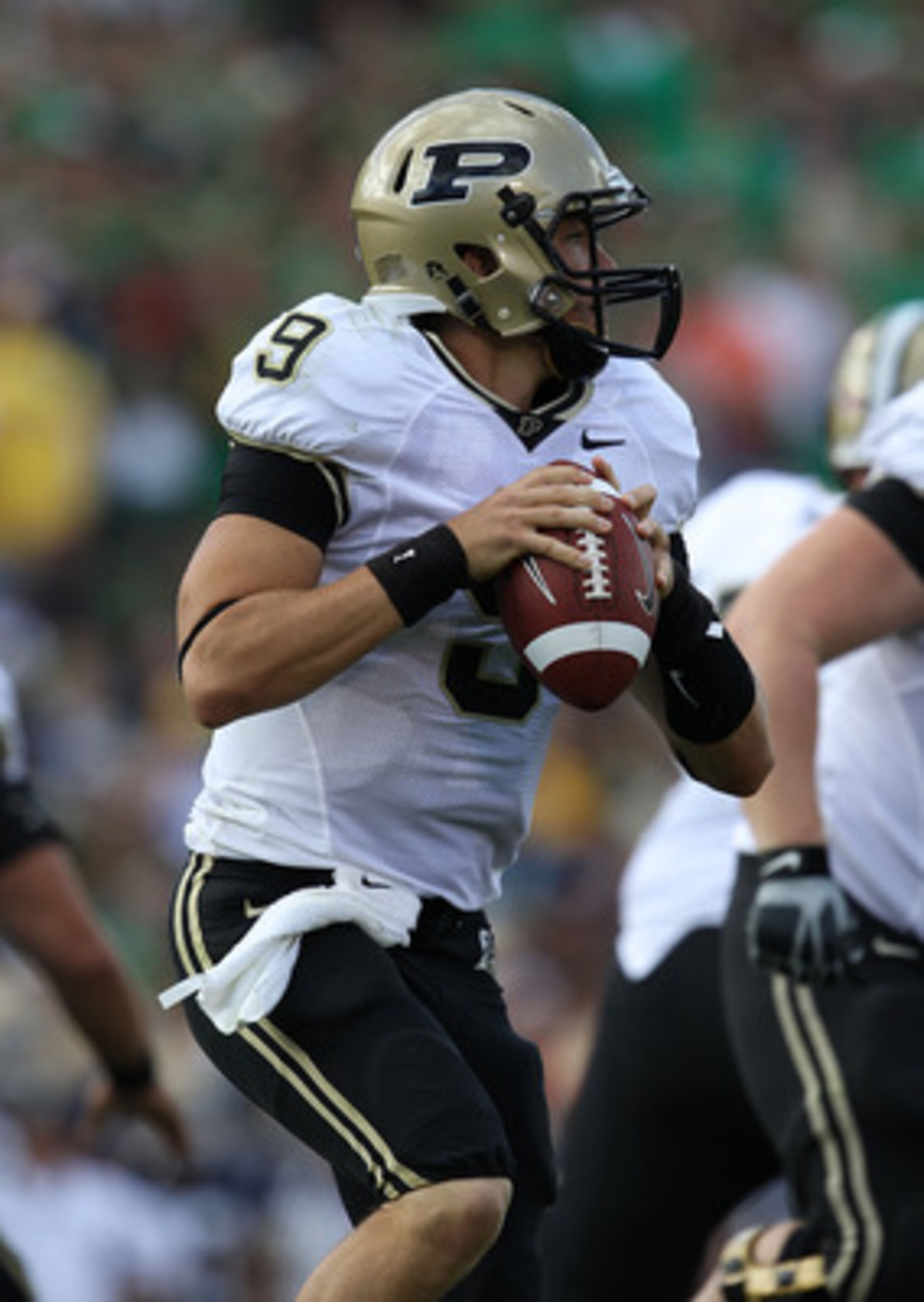 SOUTH BEND, IN - SEPTEMBER 04: Robert Marve #9 of the Purdue Boilermakers looks out while looking for a receiver against the Notre Dame Fighting Irish at Notre Dame Stadium on September 4, 2010 in South Bend, Indiana. (Photo by Jonathan Daniel/Getty Image