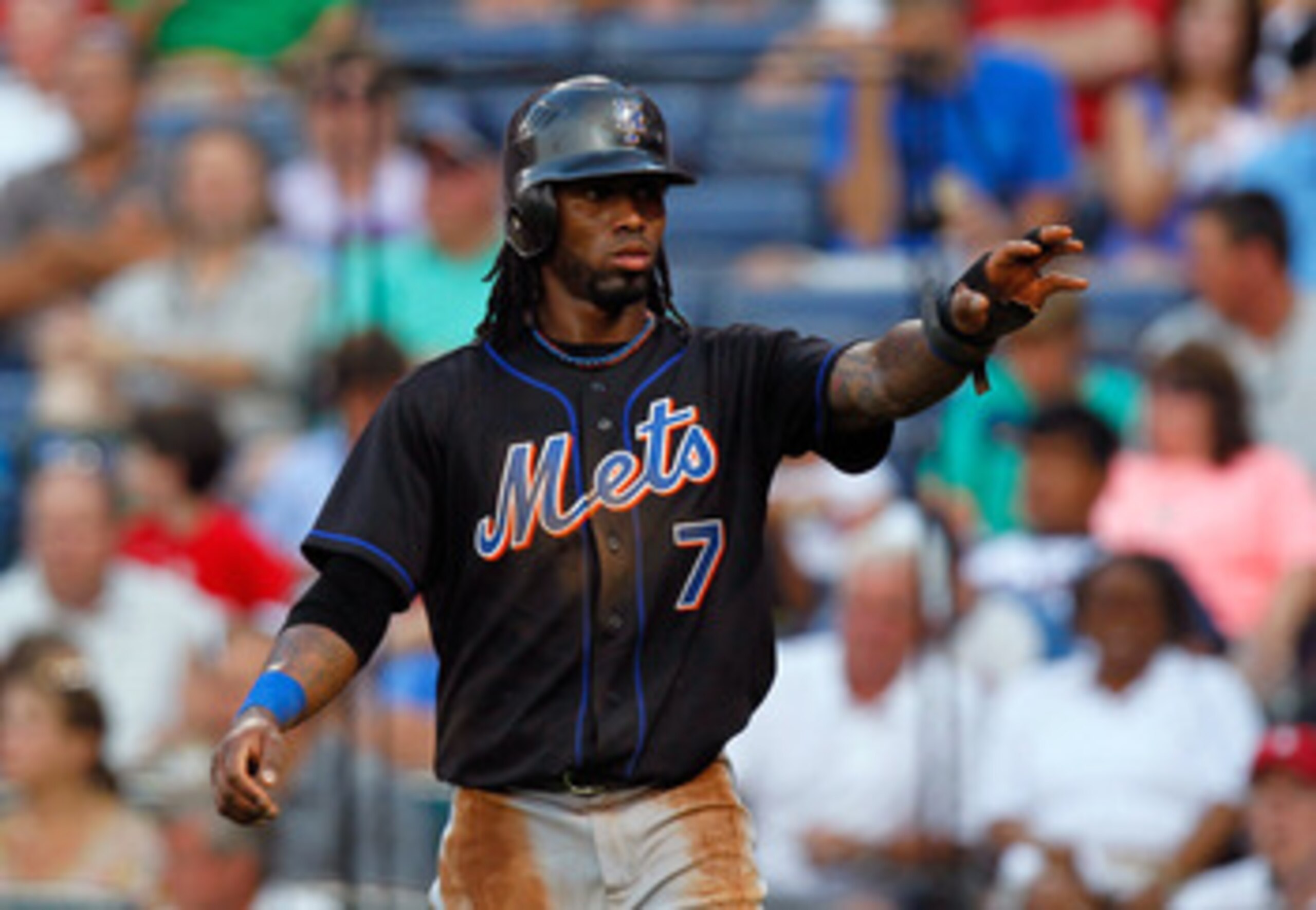 ATLANTA, GA - JUNE 14:  Jose Reyes #7 of the New York Mets reacts after scoring in the third inning against the Atlanta Braves at Turner Field on June 14, 2011 in Atlanta, Georgia.  (Photo by Kevin C. Cox/Getty Images)