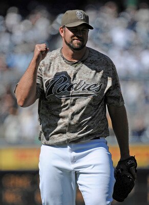 SAN DIEGO, CA - JUNE 26: Heath Bell #21 of the San Diego Padres pumps his fist after getting the final out during the ninth inning of a baseball game against the Atlanta Braves at Petco Park on June 26, 2011 in San Diego, California. The Padres won 4-1.